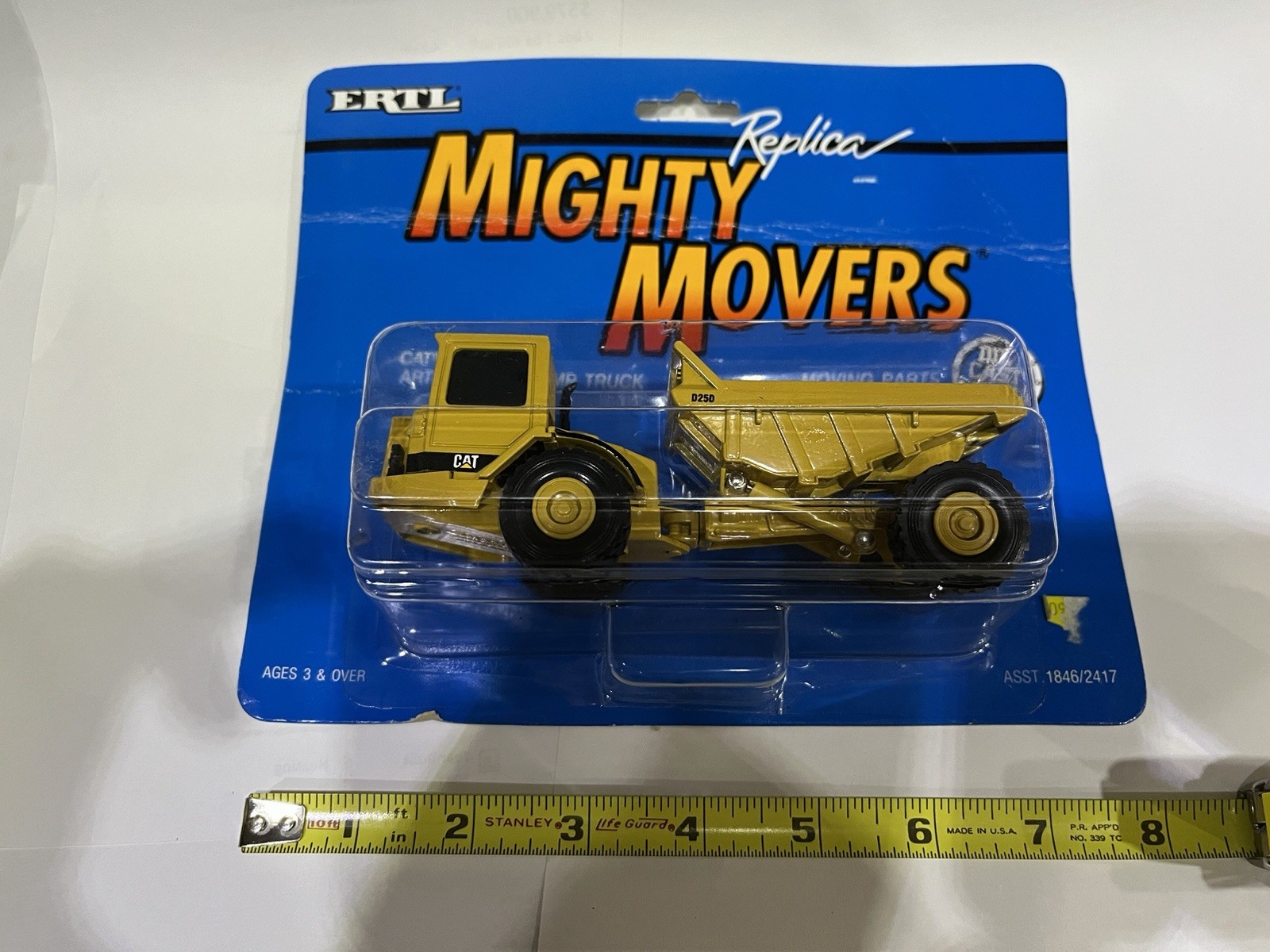 ERTL Caterpillar D25D Articulating Dump Truck Road Construction Mighty Movers