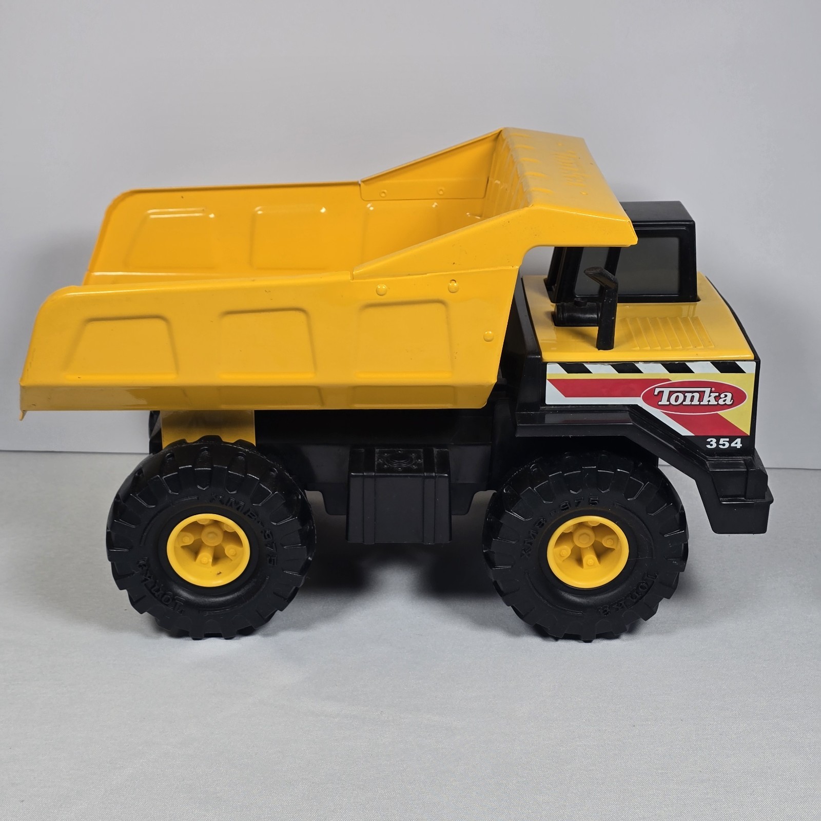 Tonka Hasbro 354 Mighty Dump Truck Yellow Steel XMB-875 Vehicle 17 Inch