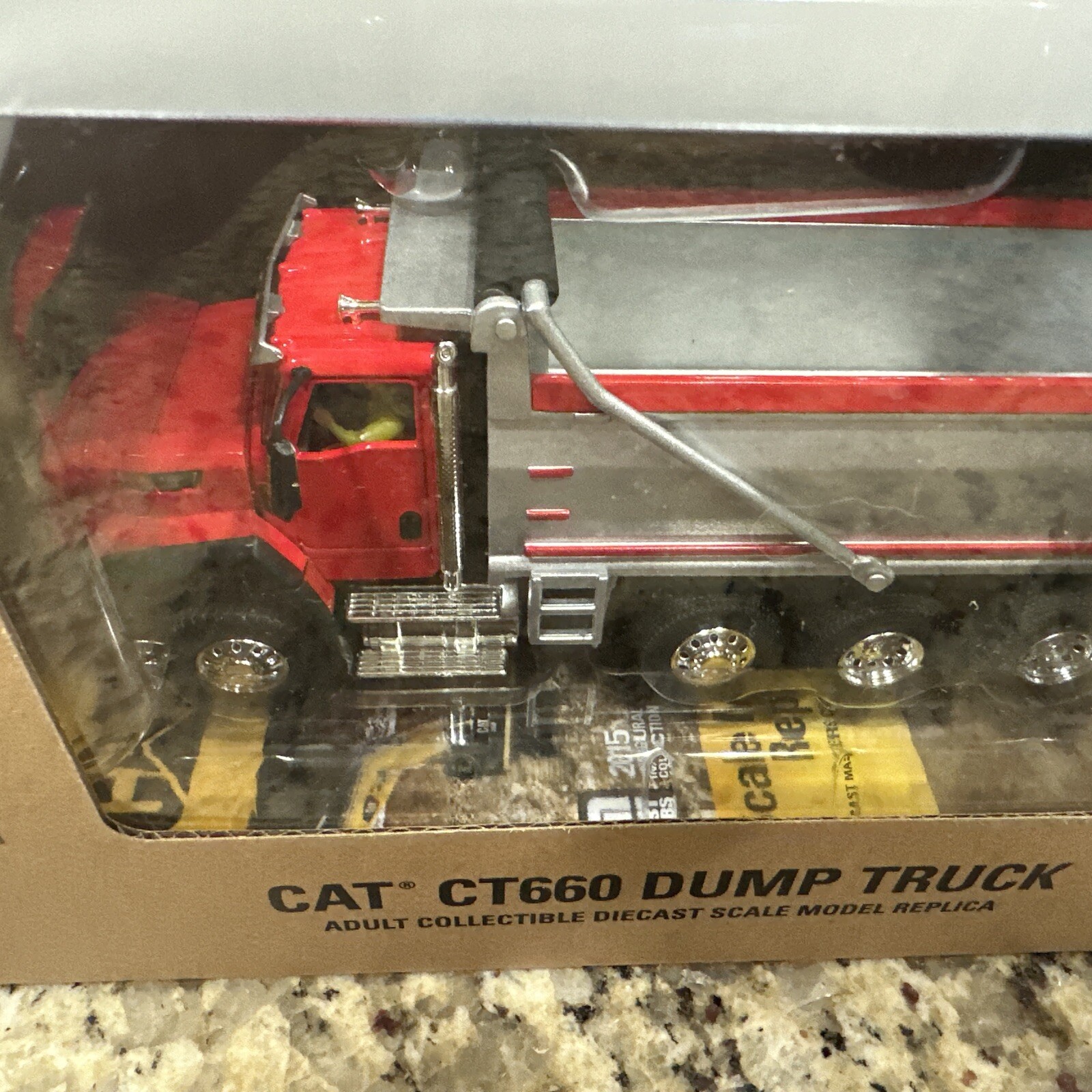 2015 DIECAST_MASTERS – CAT Core Classics CT660 Dump Truck Red 1:50 Scale