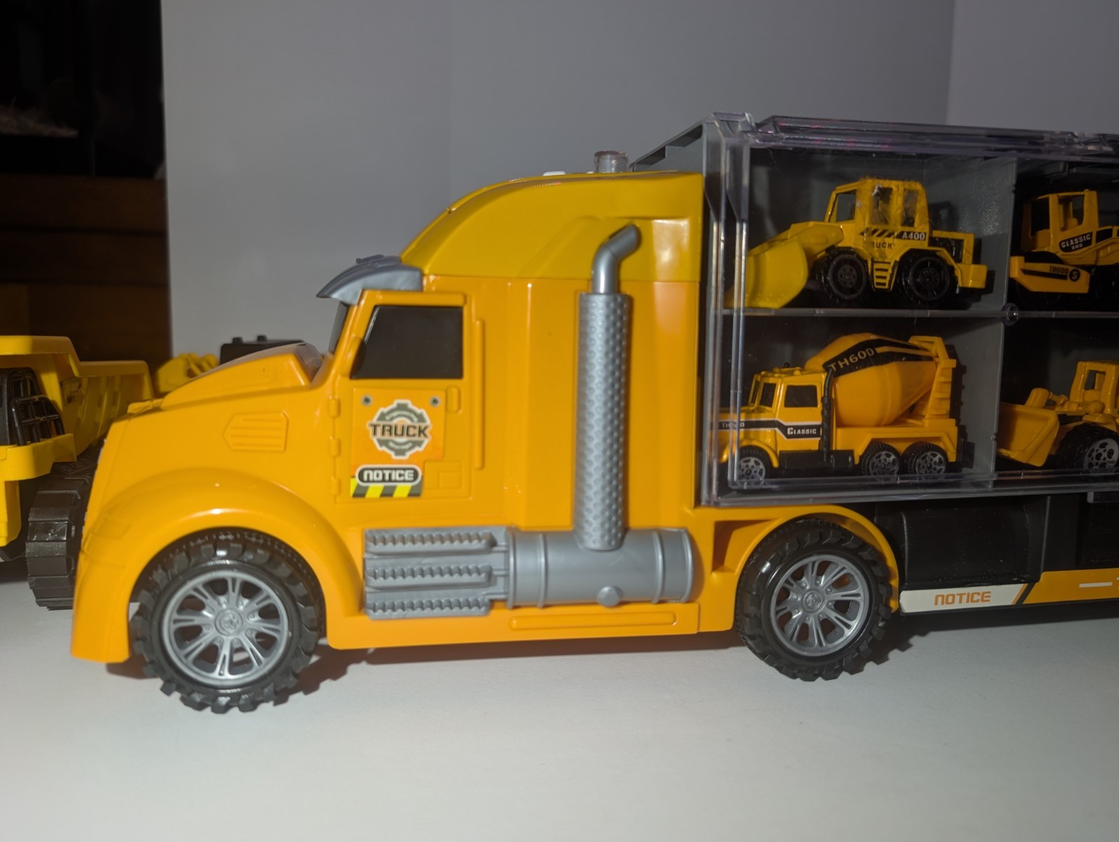 Yellow Construction Vehicle Toy Set with Carrier Truck, Models W-688, TH600D