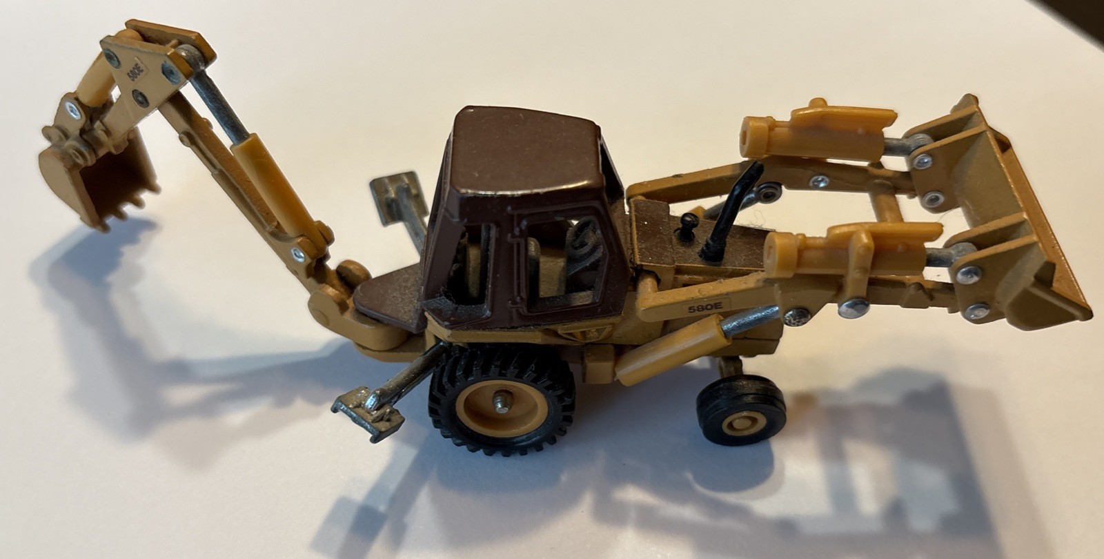 ERTL 1/64th CASE 580 SUPER E LOADER BACKHOE 1988 VINTAGE 580E Tractor