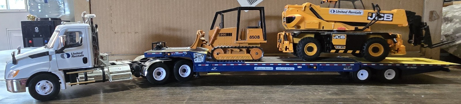 1:34FirstGear For United, Rentals, Forklift And 1:35 Tracked Bucket Loader.