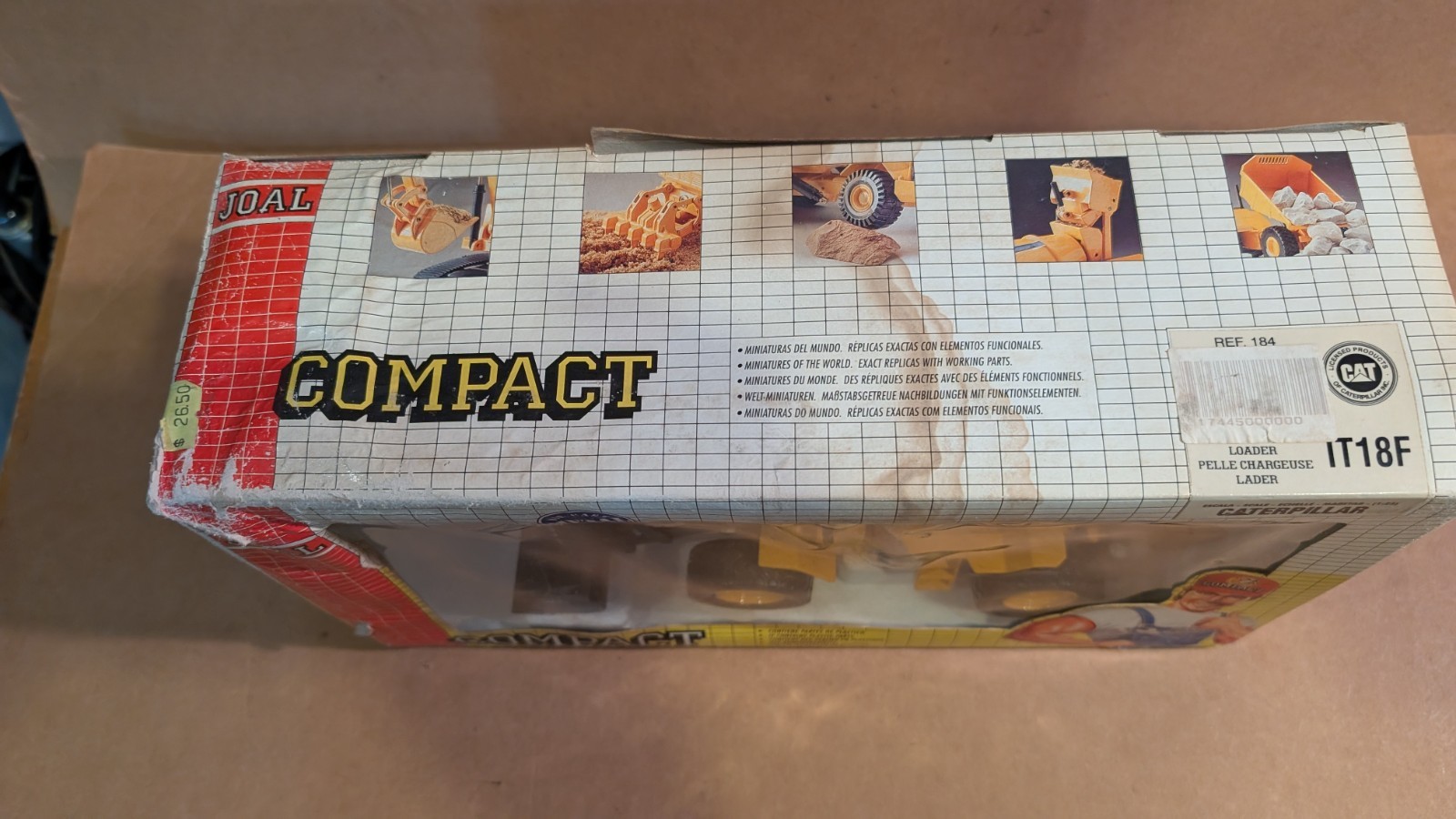 Joal Compact 1:25 scale Caterpillar Loader IT18F new in box. Box damaged