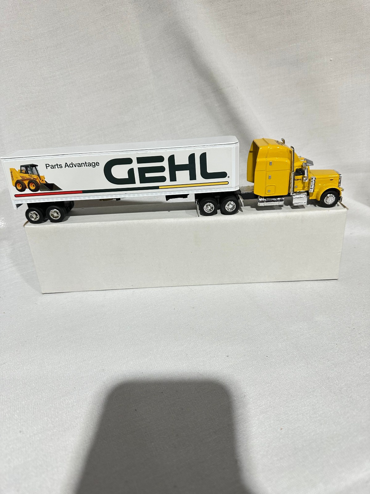 Gehl Parts Advantage Peterbilt Semi Bank Skid Loader Version 1/64th Scale