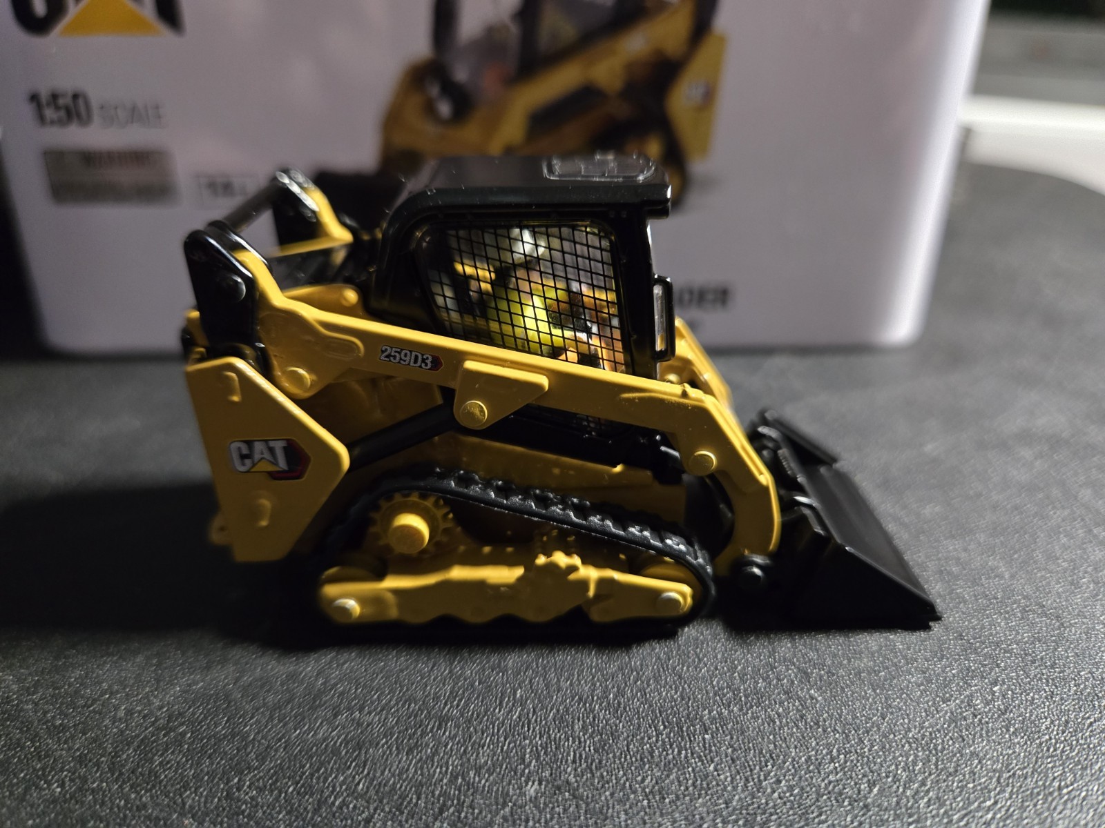 Diecast Masters 1/50 CAT 259D3 Compact Track Loader w/ accessories 85677