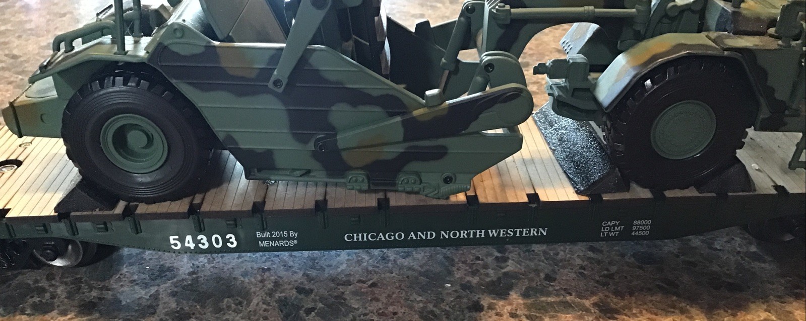Norscot Caterpillar 623G Military Elevating Scraper & CNW Menard Flatbed Trailer