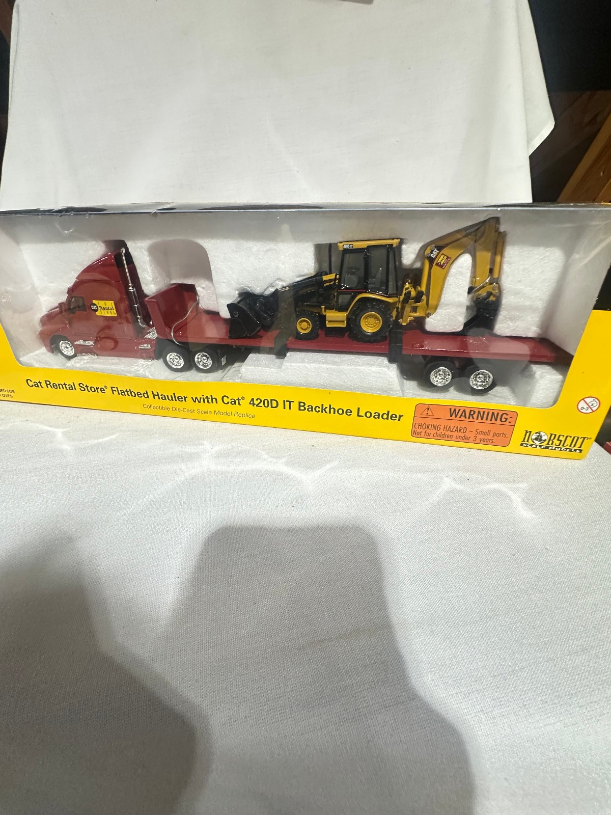 Caterpillar Rental Store Semi With 420D IT Backhoe Set By Norscot 1/50th Scale