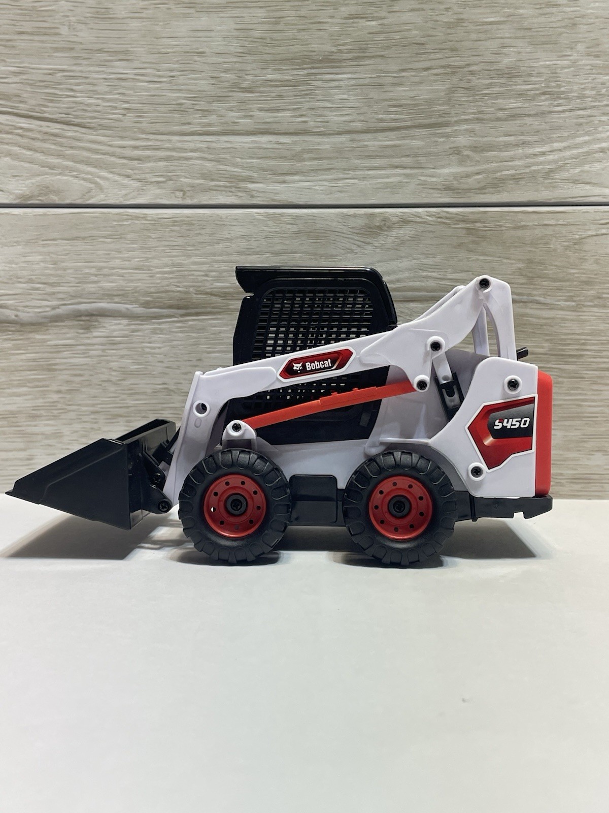 Bobcat Skid Loader Toy. Plastic.