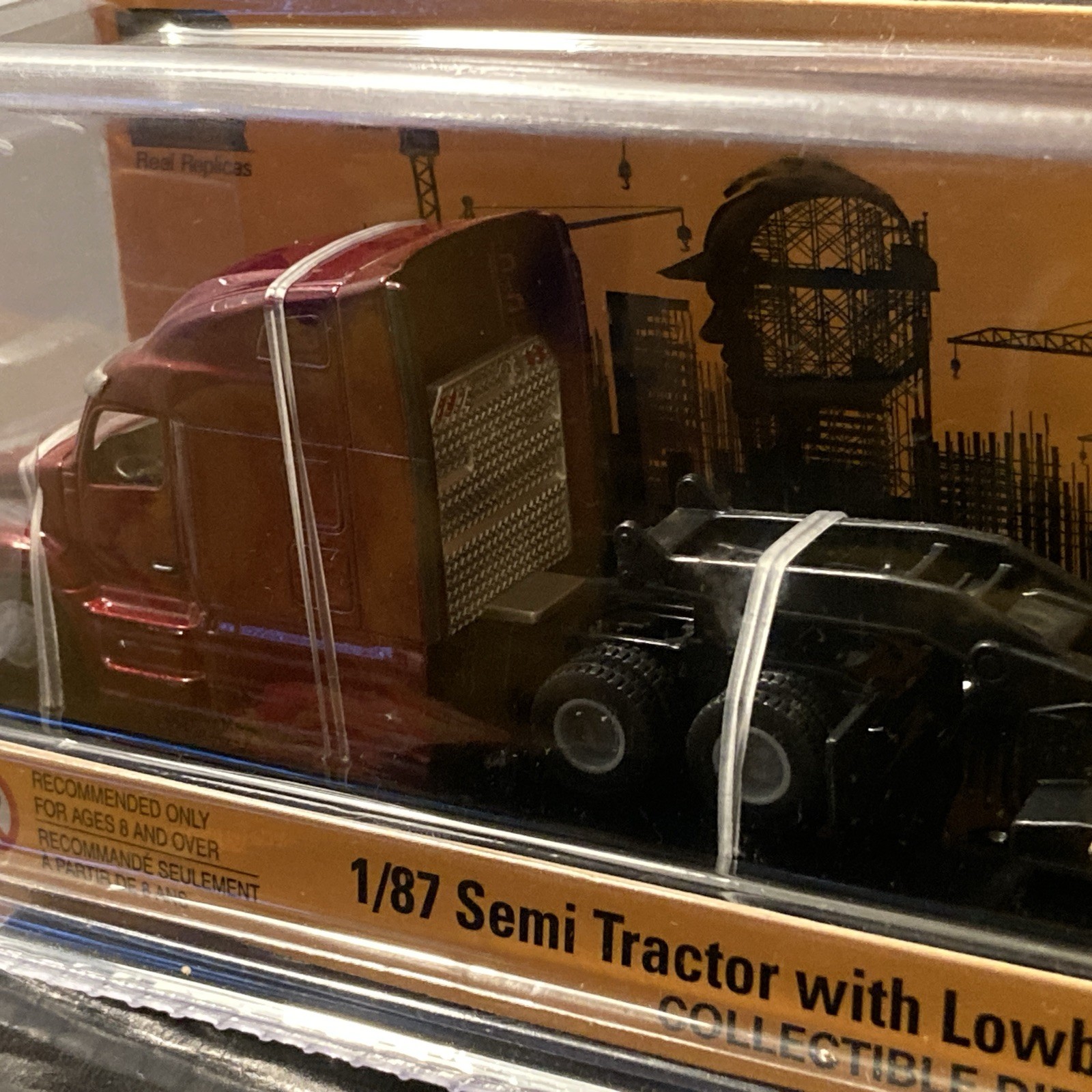 CAT 1:87 Scale Semi Tractor with Lowboy Trailer Collectible Diecast Machines