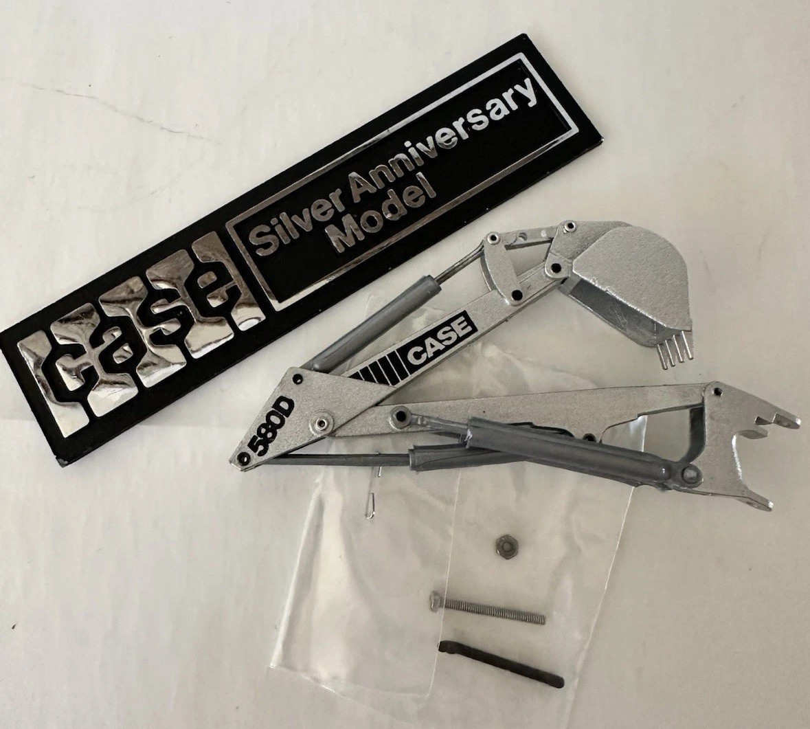 Case 580D Construction King 1:35 Silver Anniversary Diecast Backhoe Loader
