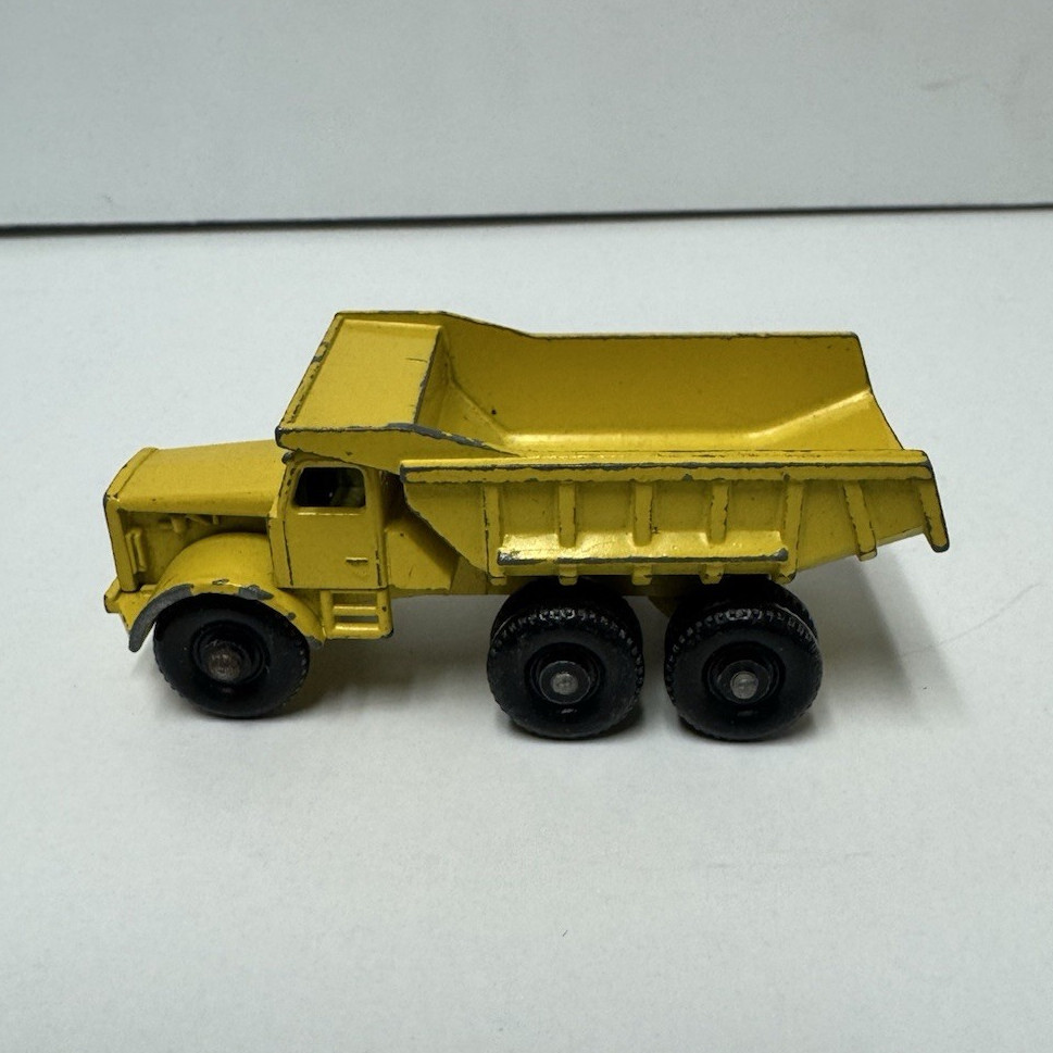 Vintage Yellow Diecast Dump Truck Construction Vehicle with Moving Parts