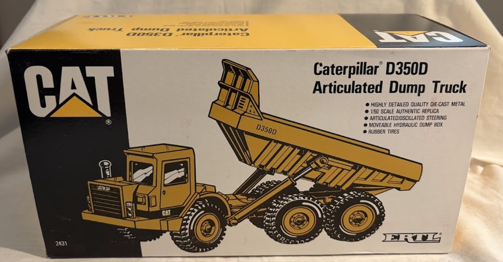 ERTL Caterpiller D350D Articulated Dump Truck New In Box