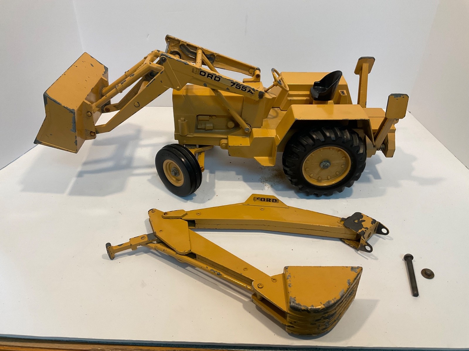 Vintage Ertl Ford 755A Backhoe Loader 1/12 for parts or restoration.