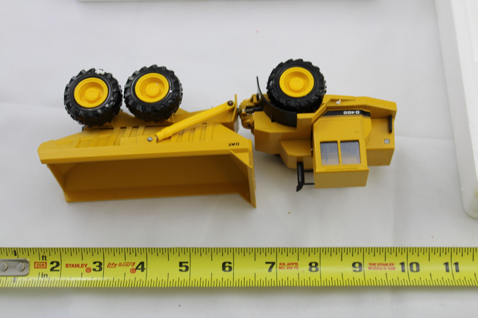 Diecast – Conrad 2862 – CAT D400 – Articulated Dump Truck