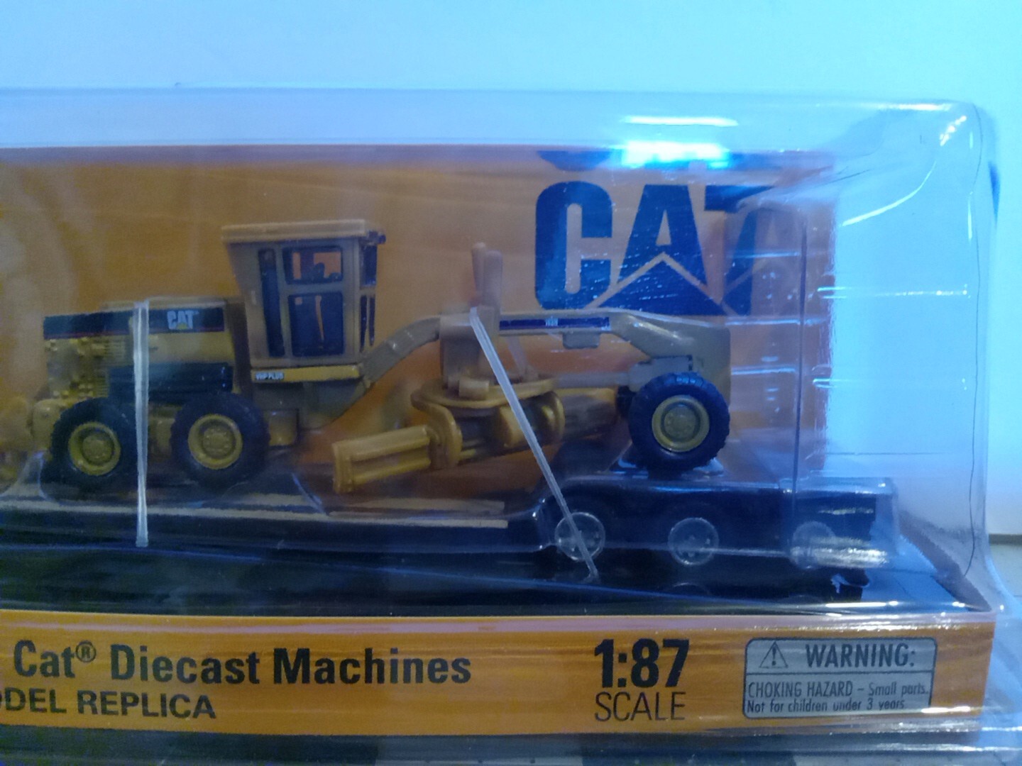 Cat CT660 Day Cab Tractor w/ Lowboy Trailer & 163H Motor Grader Diecast Model