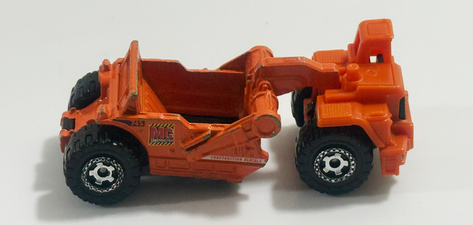 2007 Mattel Matchbox Orange Scraper MC 745 Construction Rentals Diecast Plastic
