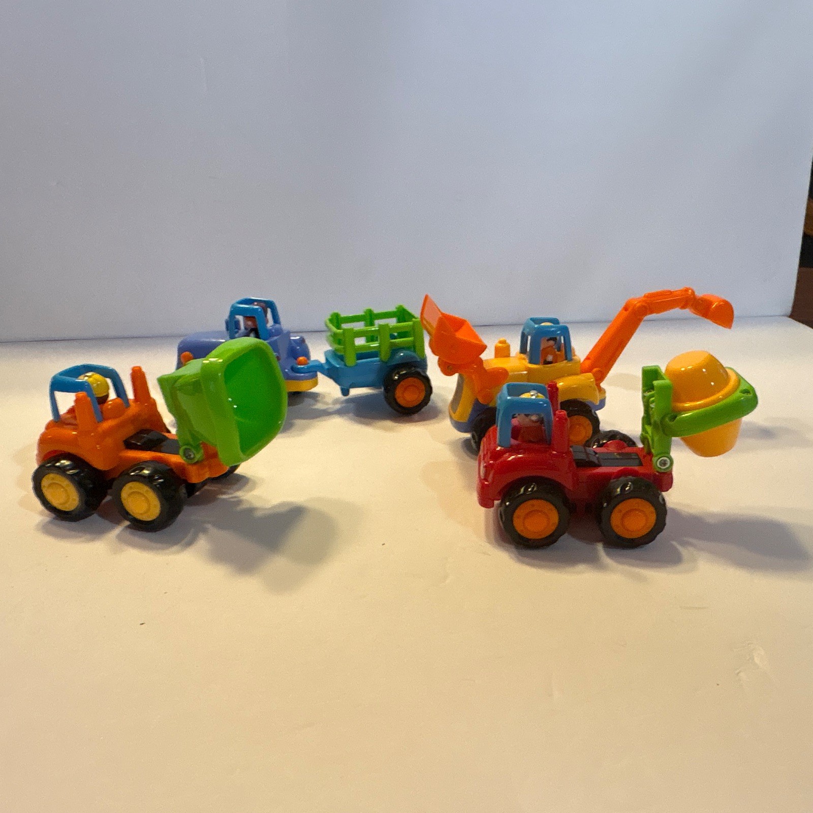 4pc Con. Vehicle Toy Lot DumpTruck Excavator Mixer Loader. All in working order