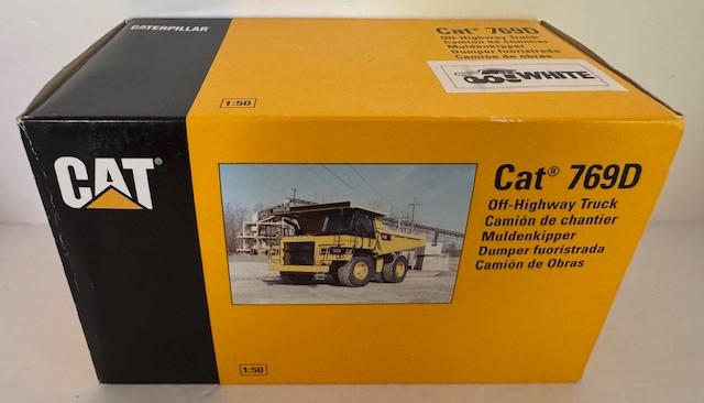 1:50 Caterpillar 769D Off Highway Dump Truck Diecast Model In White #477 By NZG