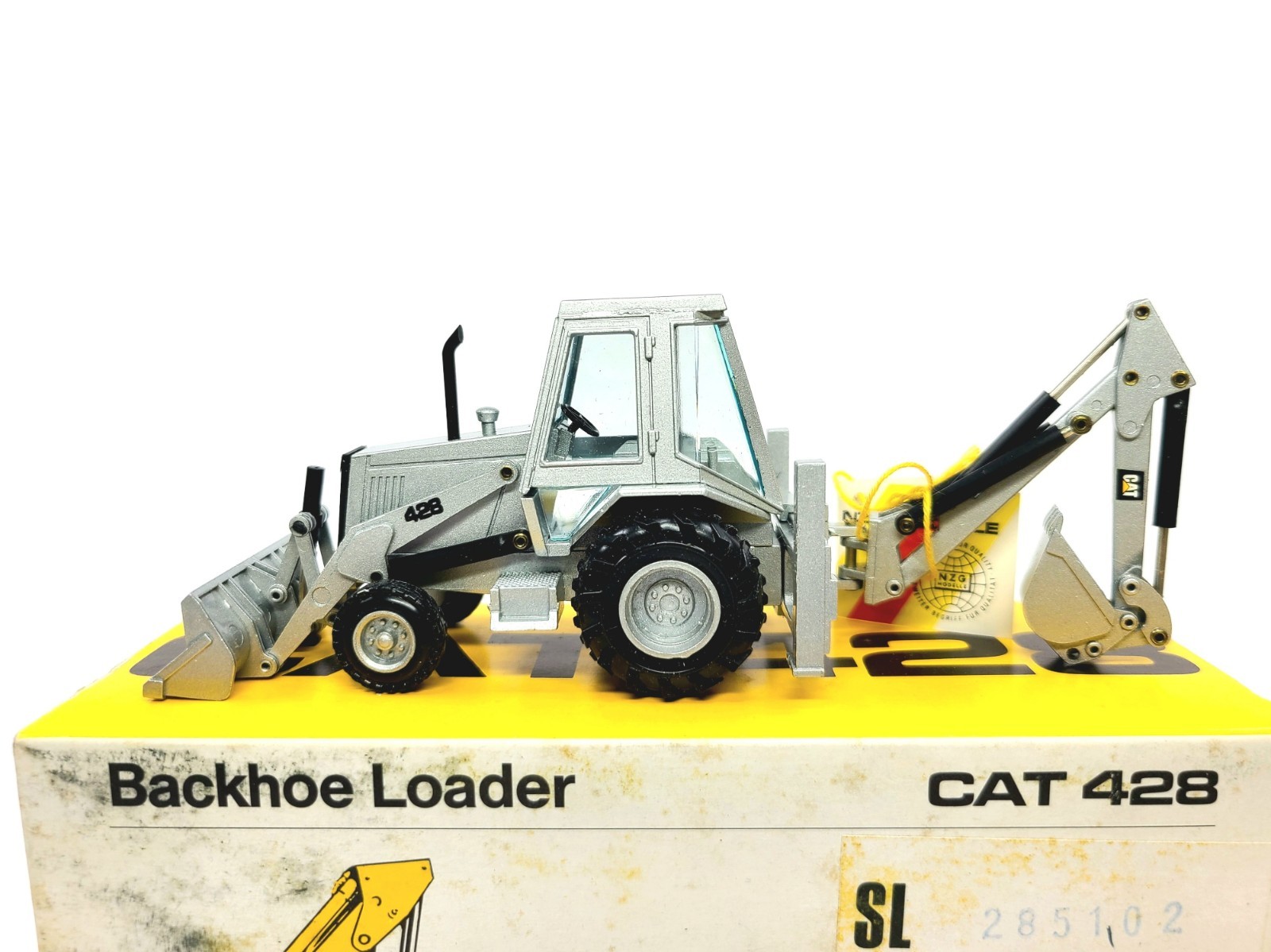 Caterpillar Cat 428 Backhoe Loader Cab – Silver NZG 1:50 Scale Model #285.1S New