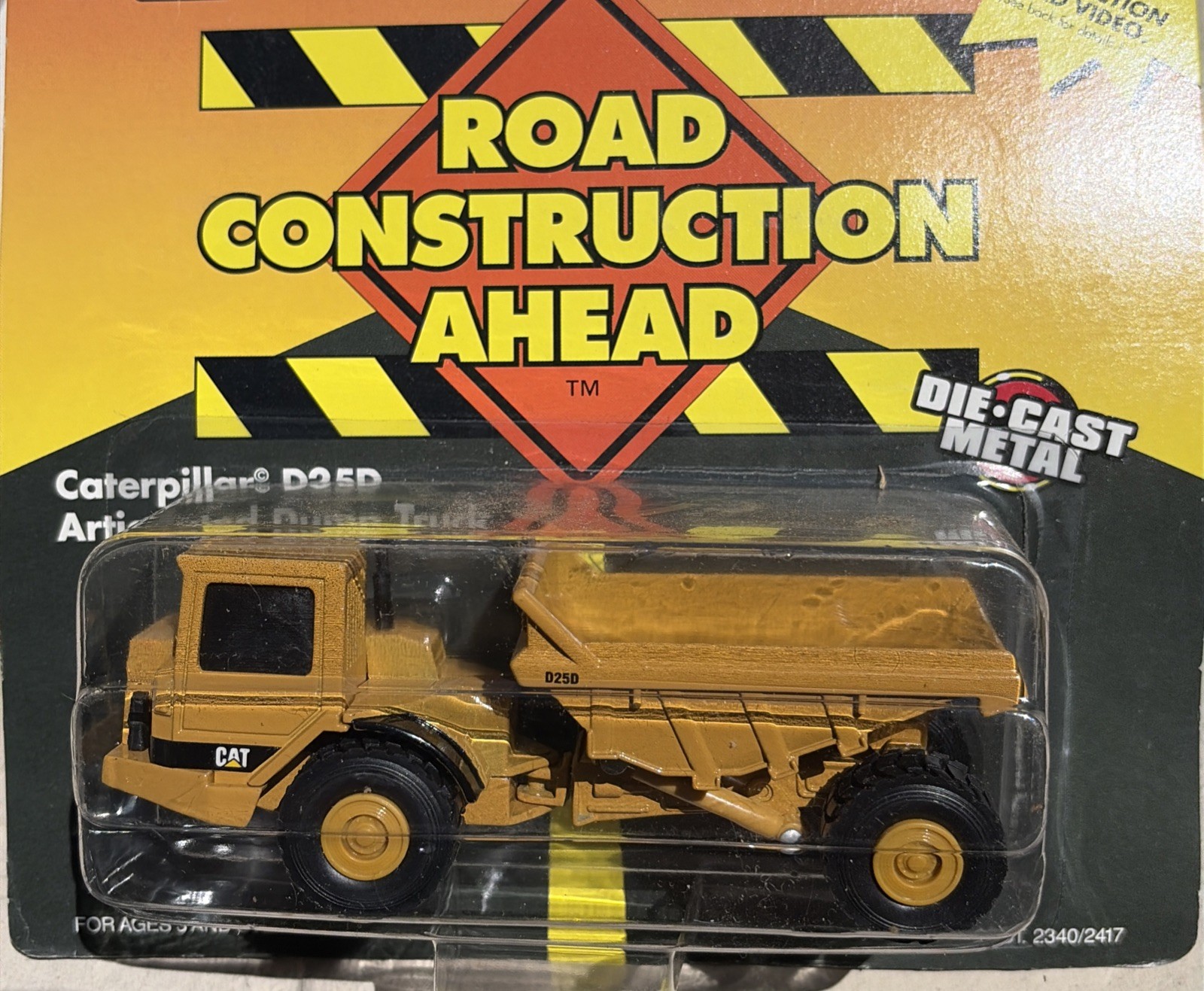 ERTL Road Construction Ahead Caterpillar D25D Articulated Dump Truck Die Cast