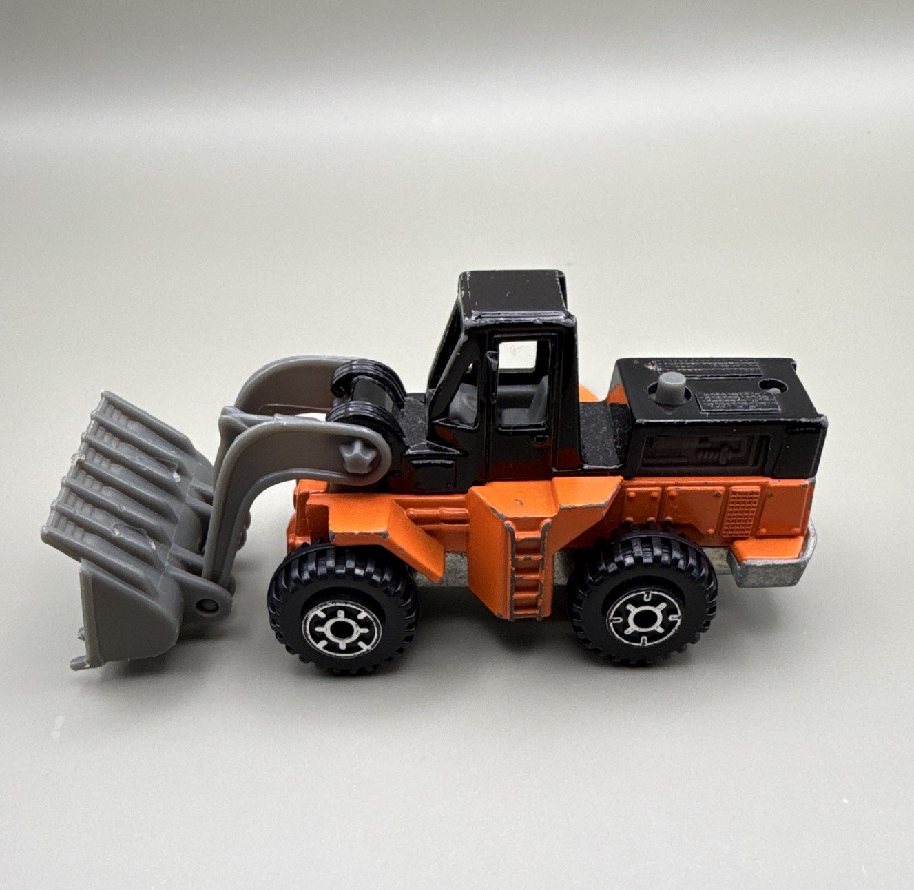 Hot Wheels Wheel Loader: Orange and Black