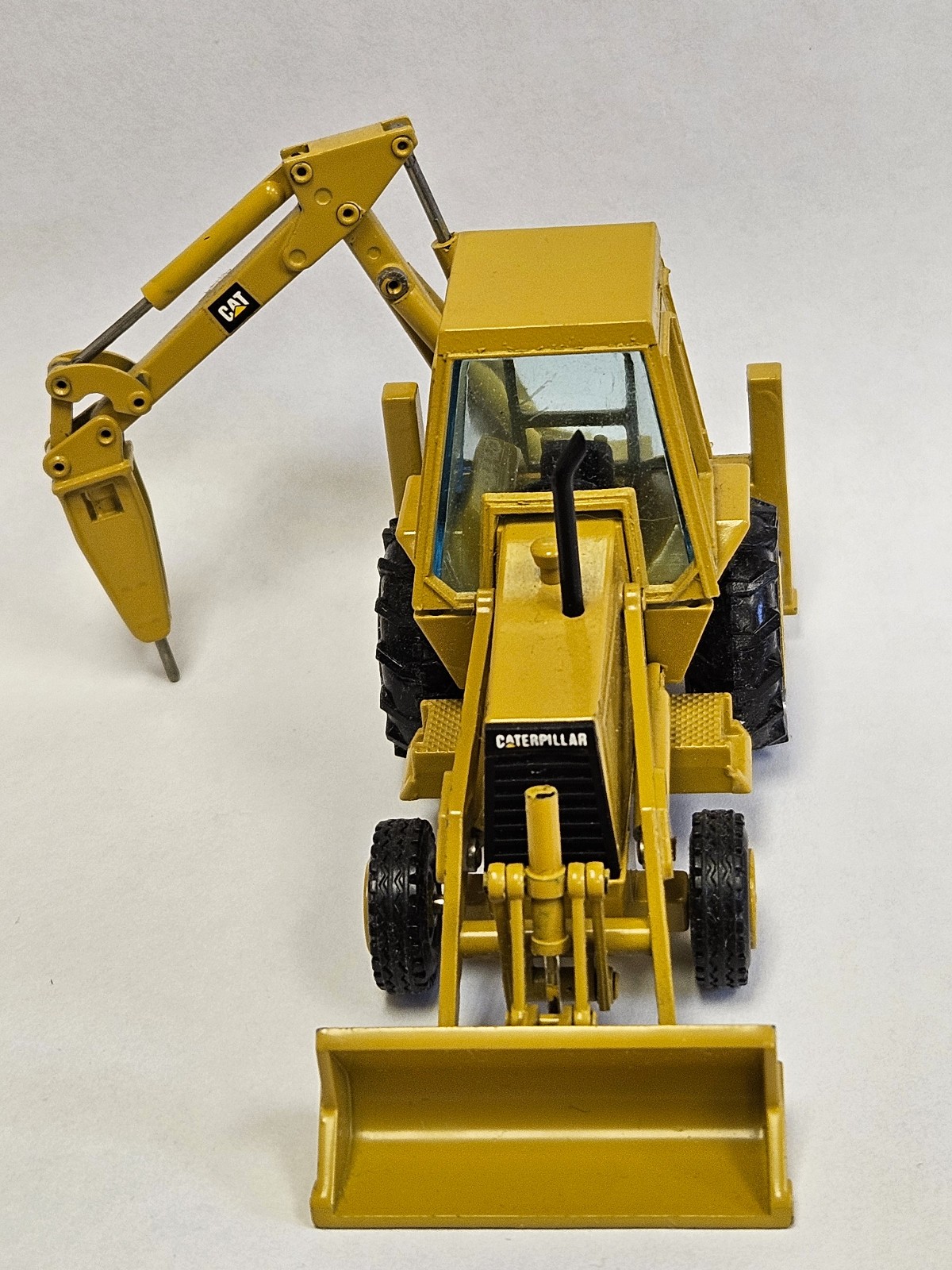 NZG CAT 428 Backhoe Loader