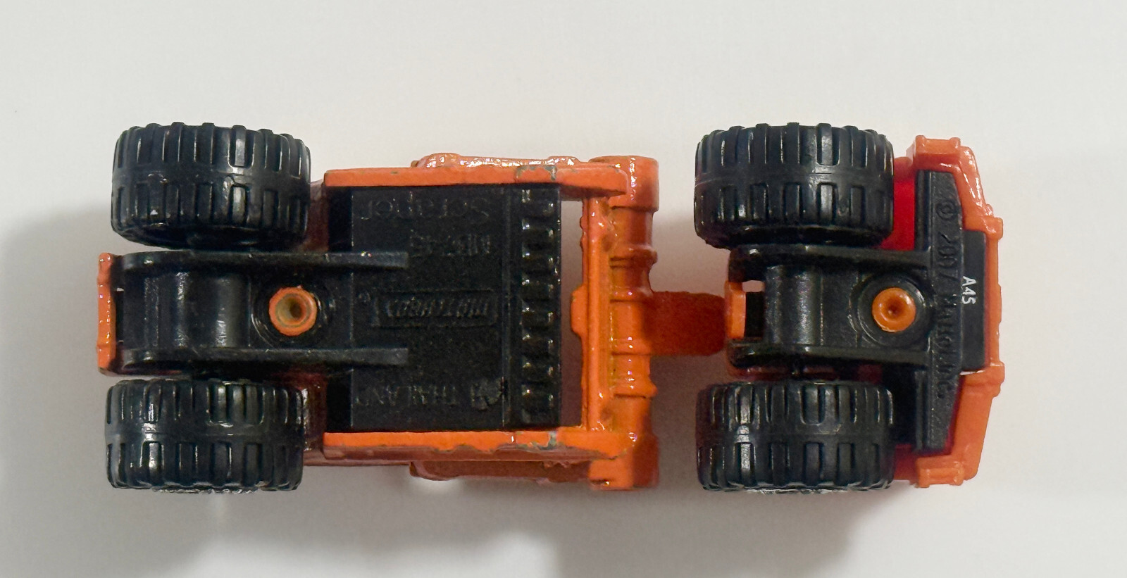 2007 Mattel Matchbox Orange Scraper MC 745 Construction Rentals Diecast Plastic