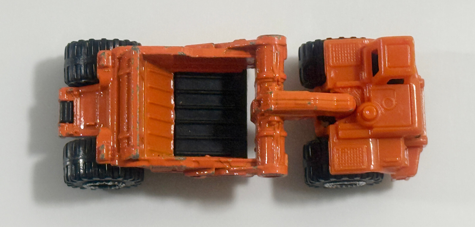 2007 Mattel Matchbox Orange Scraper MC 745 Construction Rentals Diecast Plastic