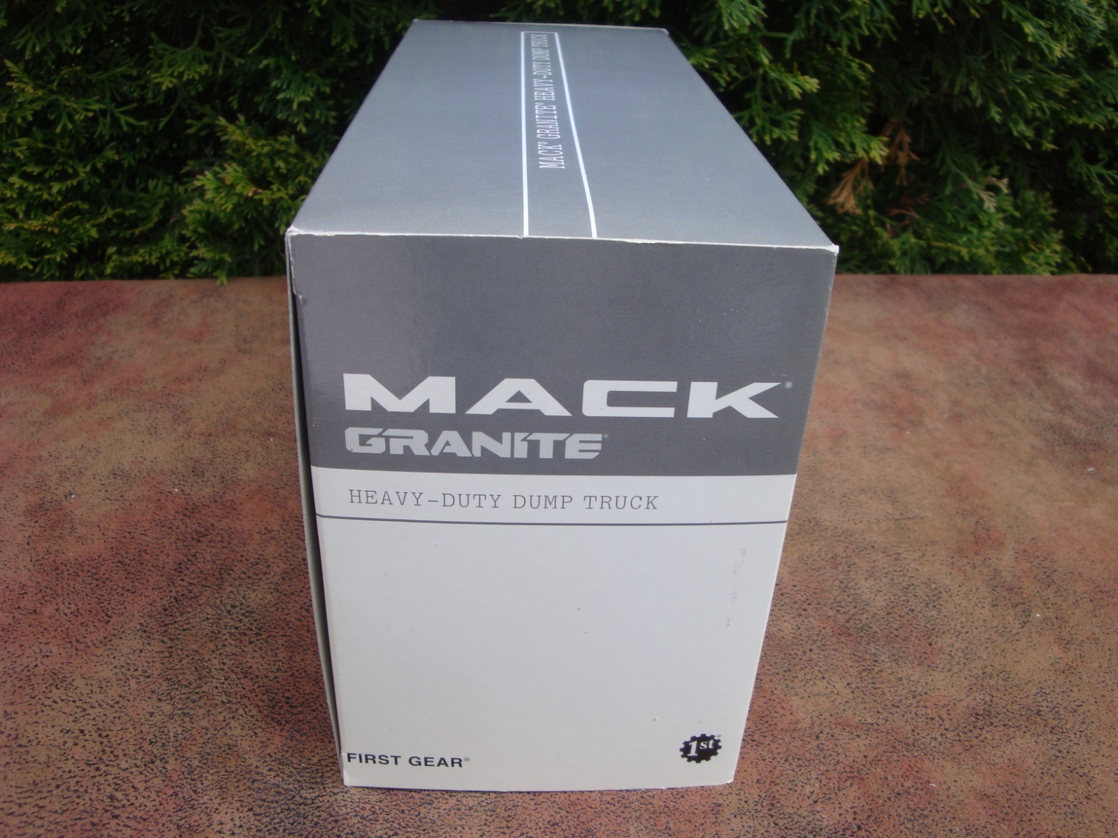 Mack Granite Heavy-Duty Dark Green Dump Truck- 1:34 scale by First Gear (2003)