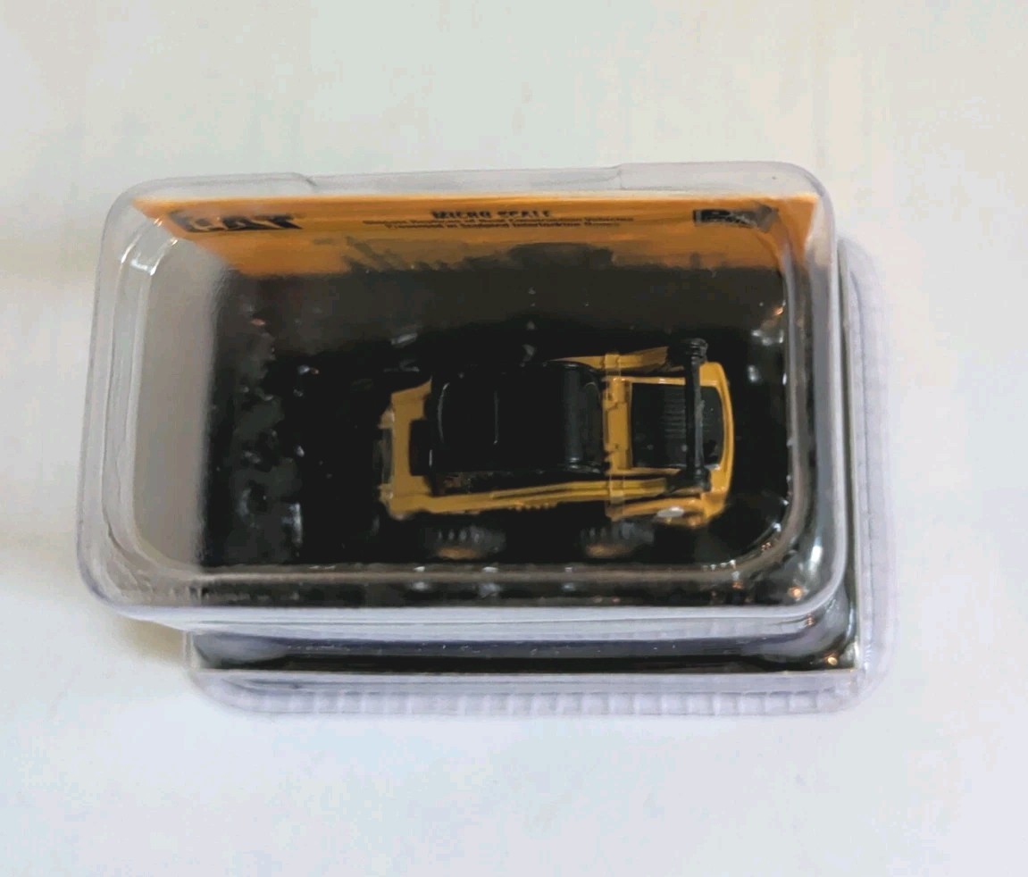 Diecast Masters Cat Micro 272C Skid Steer Loader Micro Constructors Series