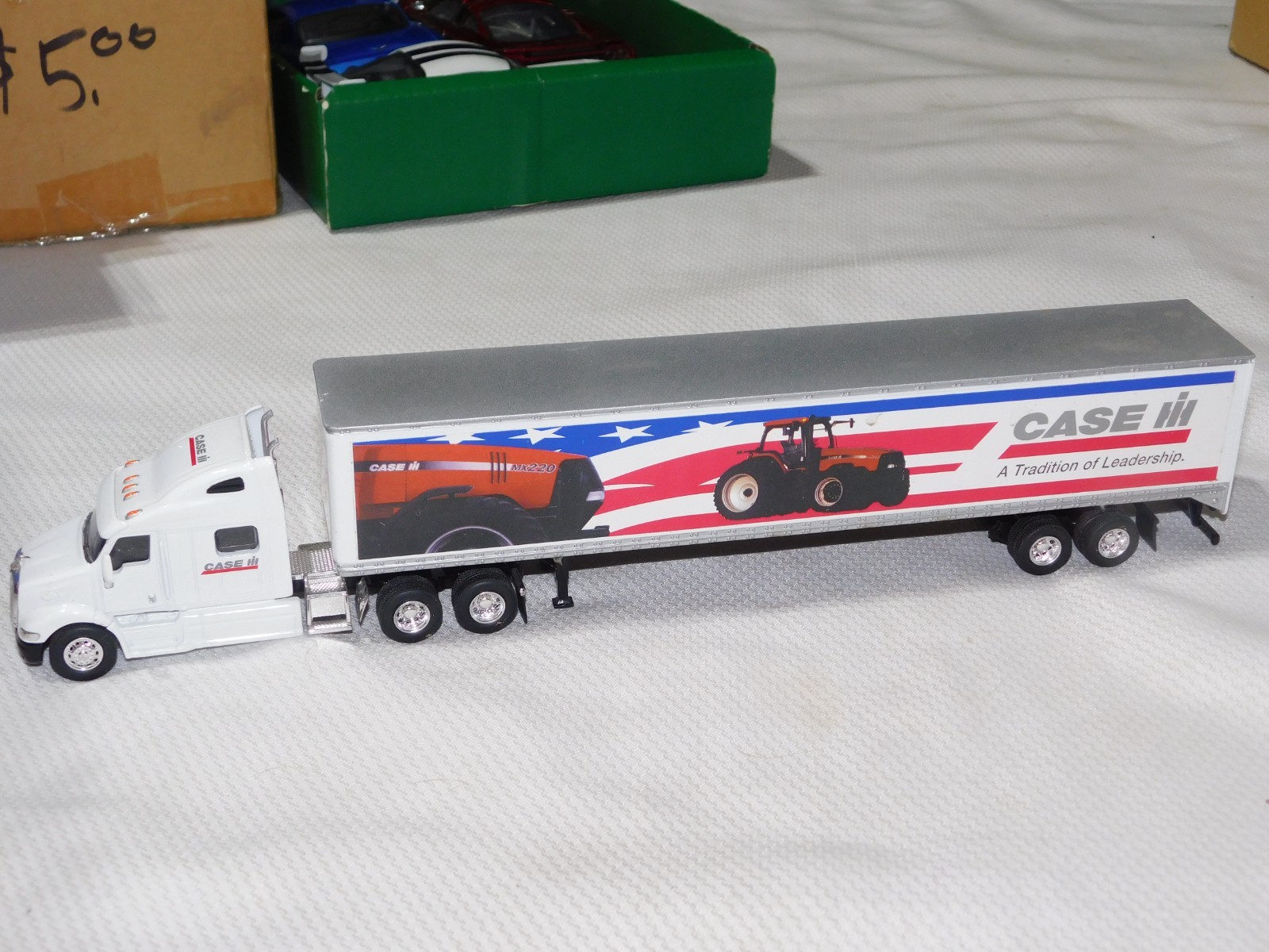 Diecast SpecCast Peterbilt 387 CASE lil TRACTORS 13″ TRACTOR TRAILER TRUCK