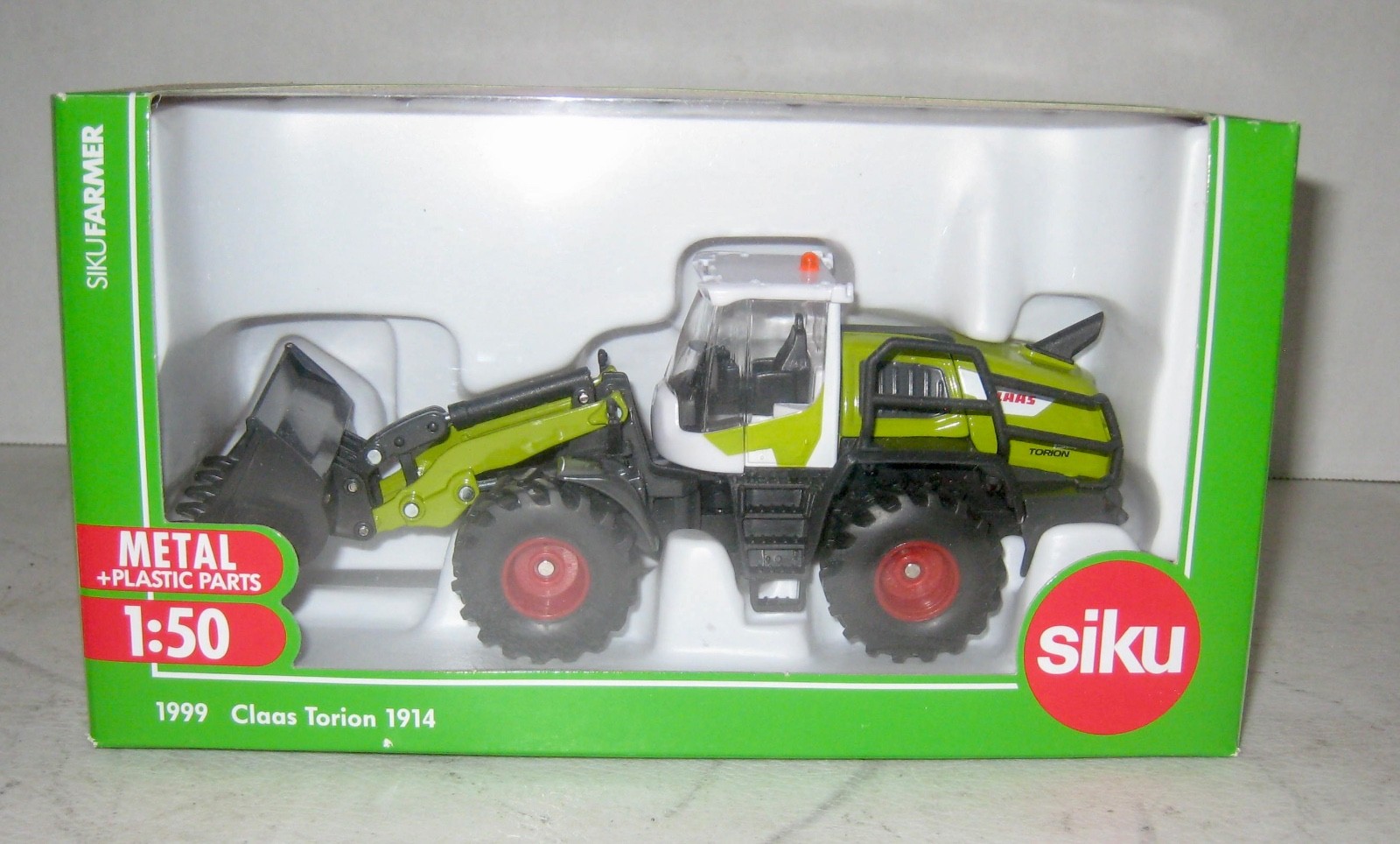 1/50 Siku #1999 Claas Torian 1914 articulated loader. NIB