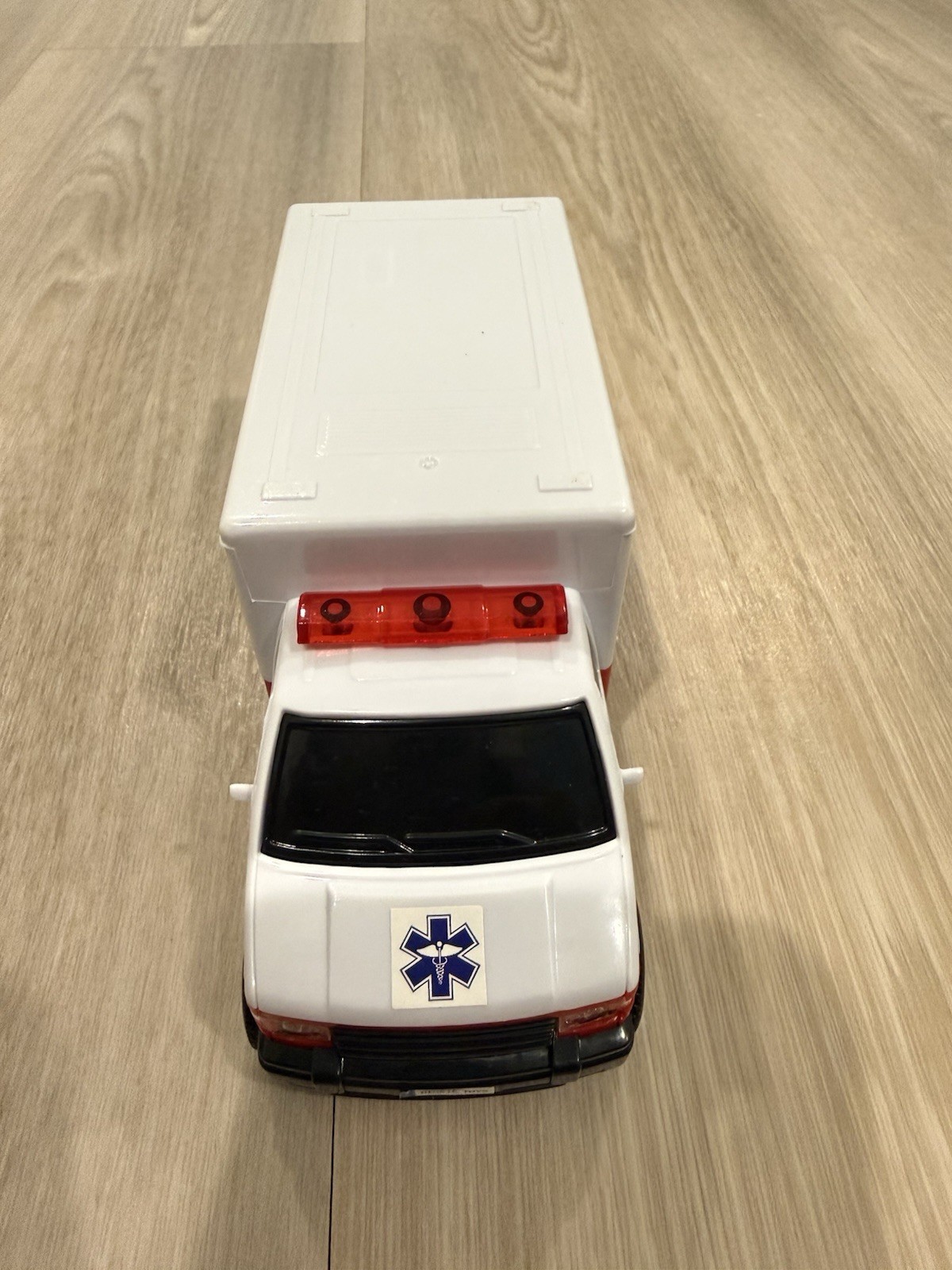 Lot of 3 vehicles: fire truck, ambulance, and dump truck.