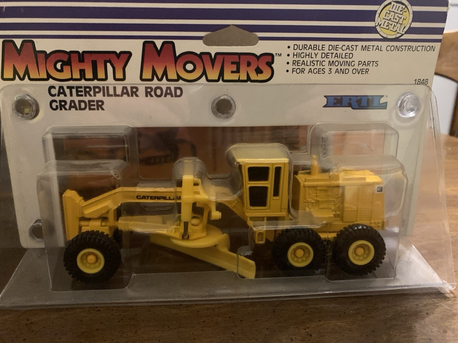 1/64th scale Caterpillar Road Grader – 1988 ERTL Mighty Movers – Diecast Toy