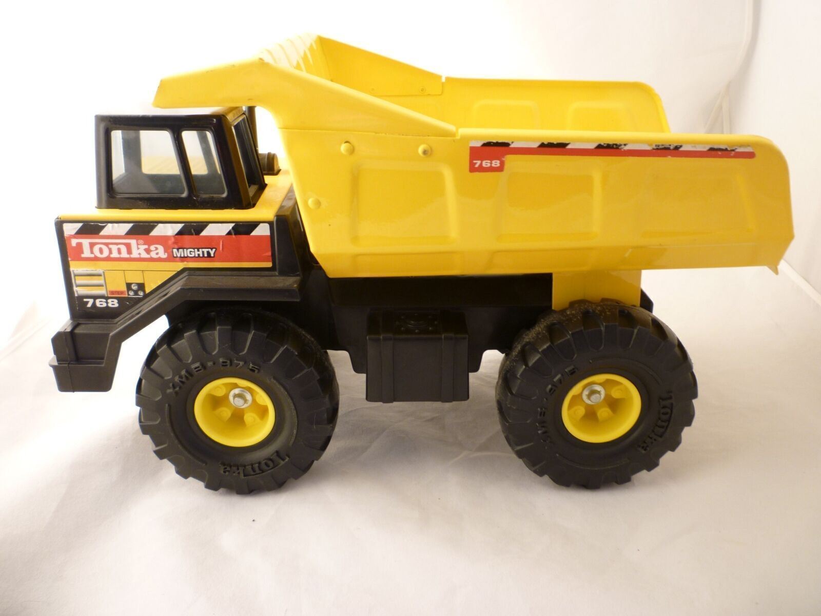 Tonka Mighty Dump Truck 768 Yellow Tires XMB-975 Clean 1999