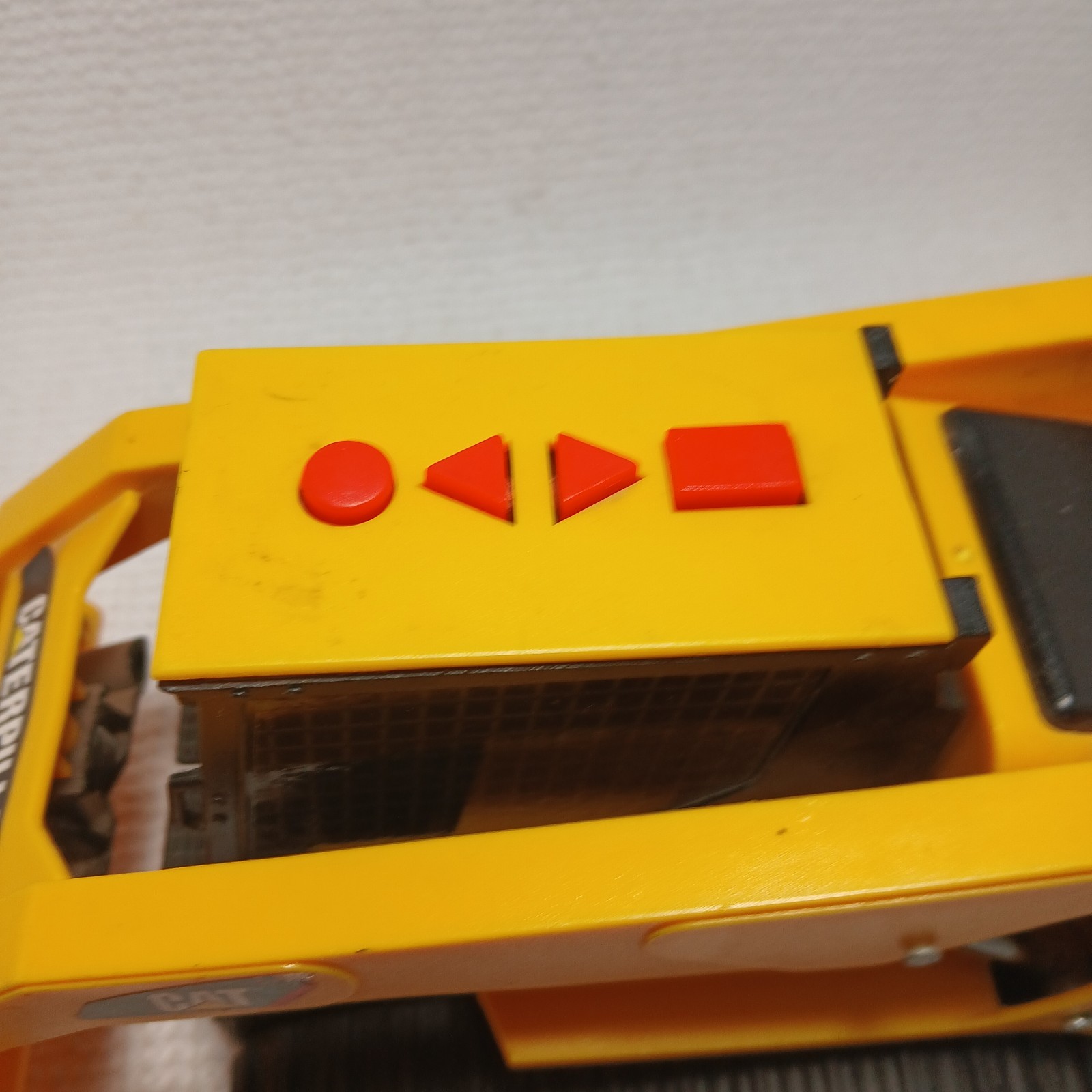Caterpillar (CAT) toy skid steer loader, likely a “Big Builder”. UNTESTED