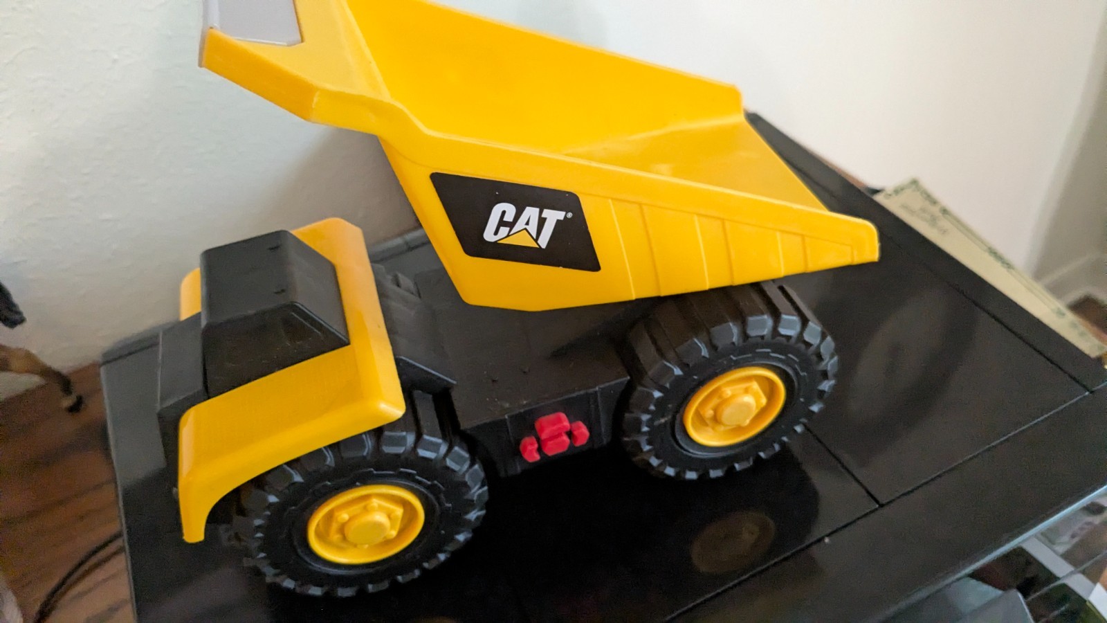 CAT Caterpillar Plastic Dump Truck Lights Sounds Vibrates