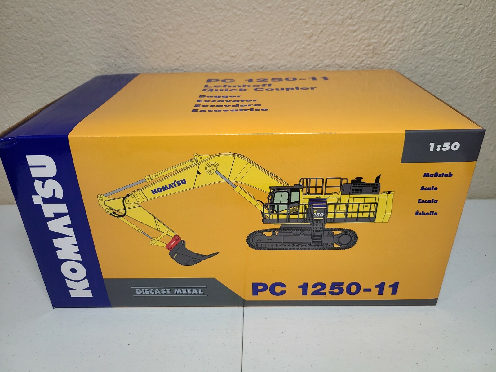 Komatsu PC1250-11 Excavator Quick Coupler – Yellow – NZG 1:50 Scale #9992 New