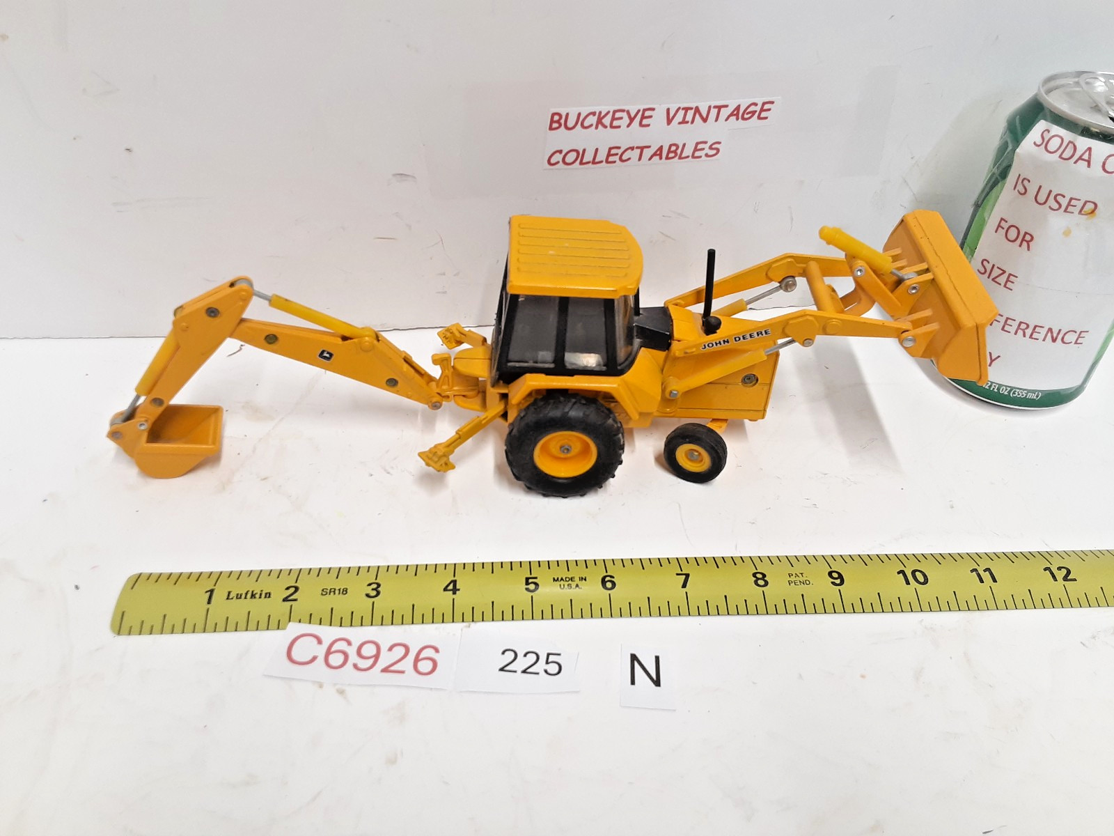 Ertl ~John Deere 310D Backhoe/Loader Yellow, 1:32 Scale No Box
