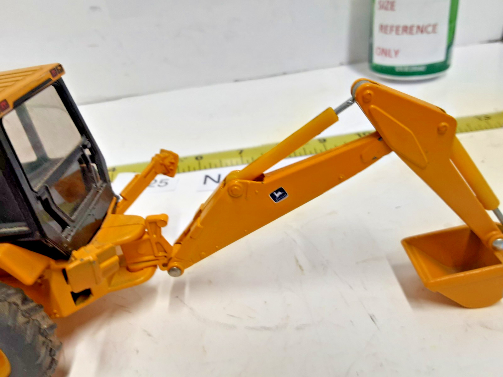 Ertl ~John Deere 310D Backhoe/Loader Yellow, 1:32 Scale No Box