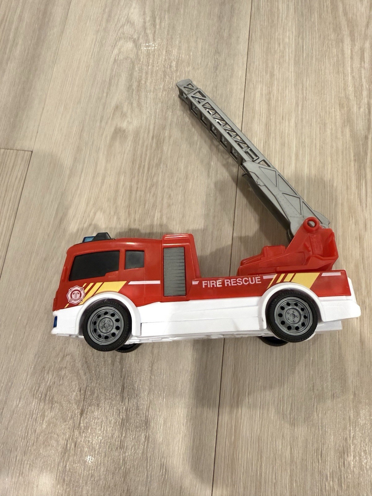 Lot of 3 vehicles: fire truck, ambulance, and dump truck.