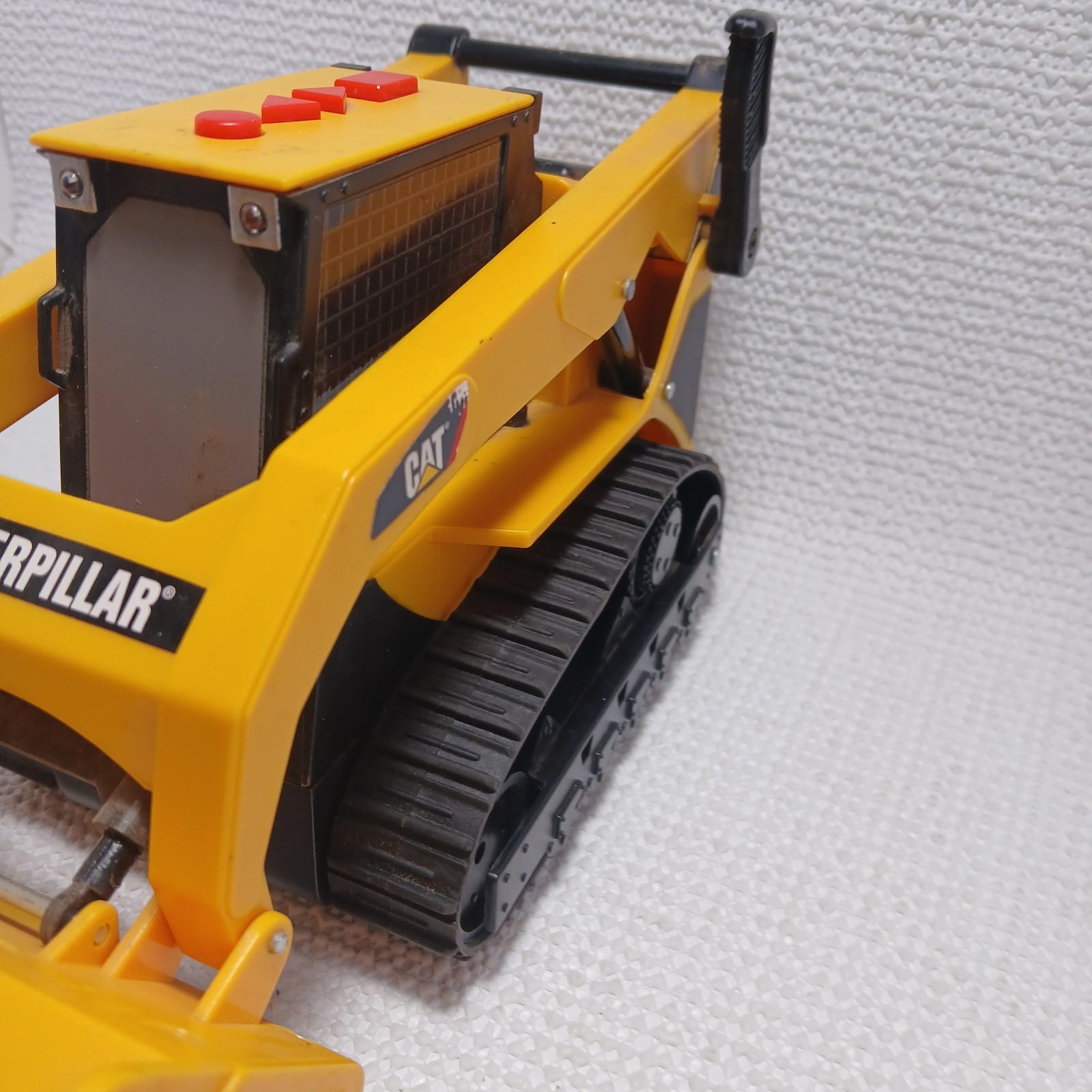 Caterpillar (CAT) toy skid steer loader, likely a “Big Builder”. UNTESTED