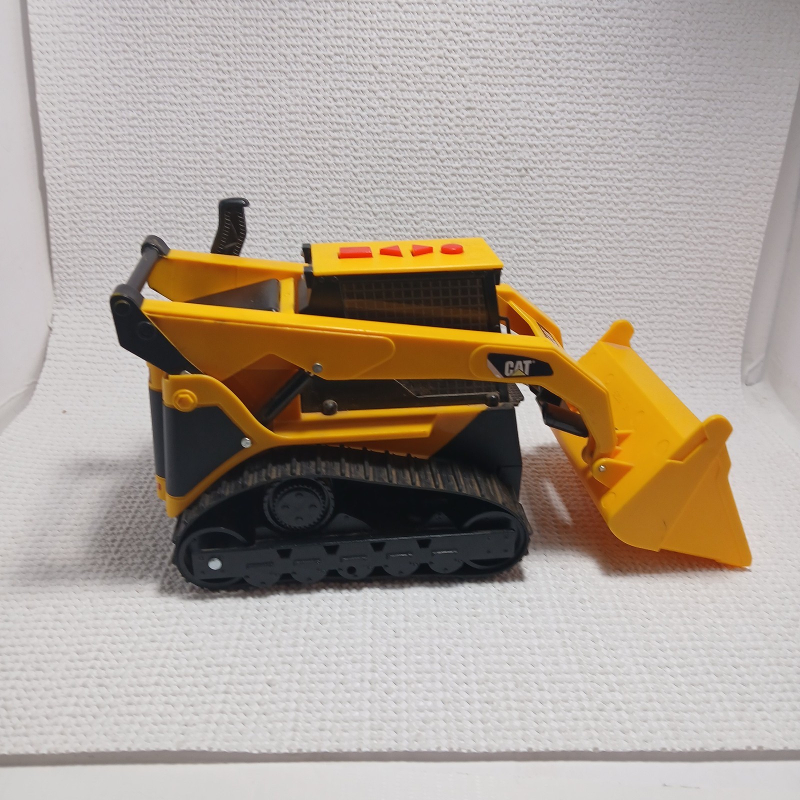 Caterpillar (CAT) toy skid steer loader, likely a “Big Builder”. UNTESTED