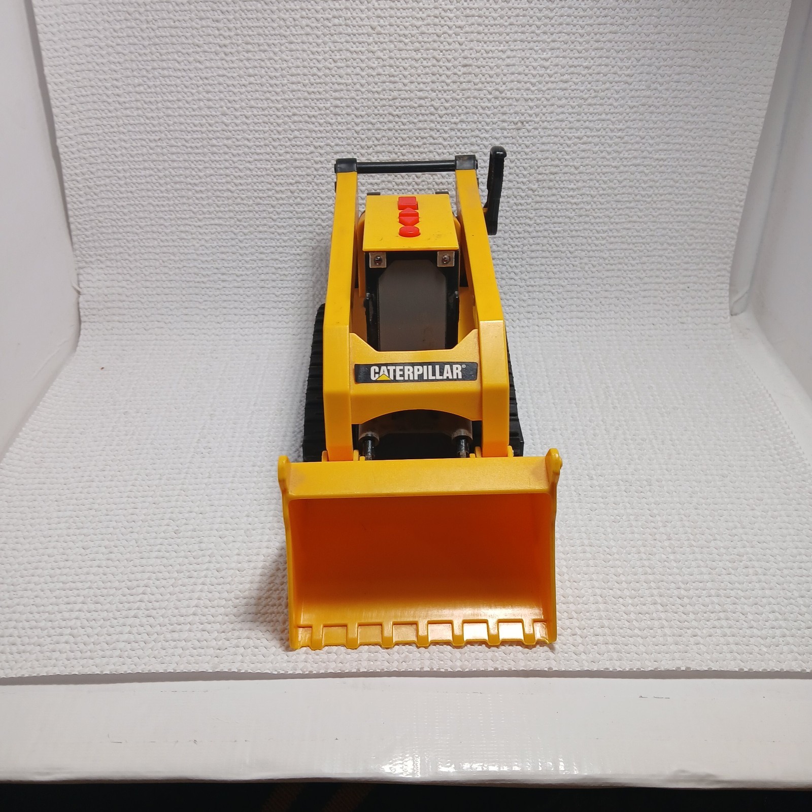 Caterpillar (CAT) toy skid steer loader, likely a “Big Builder”. UNTESTED