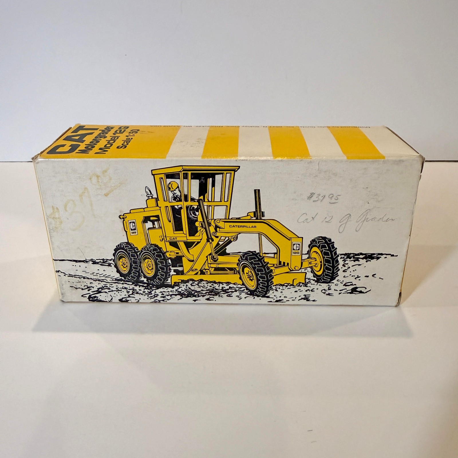 CAT Motorgrader Model 12G Scale 1:50 Die-cast Model NZG Models