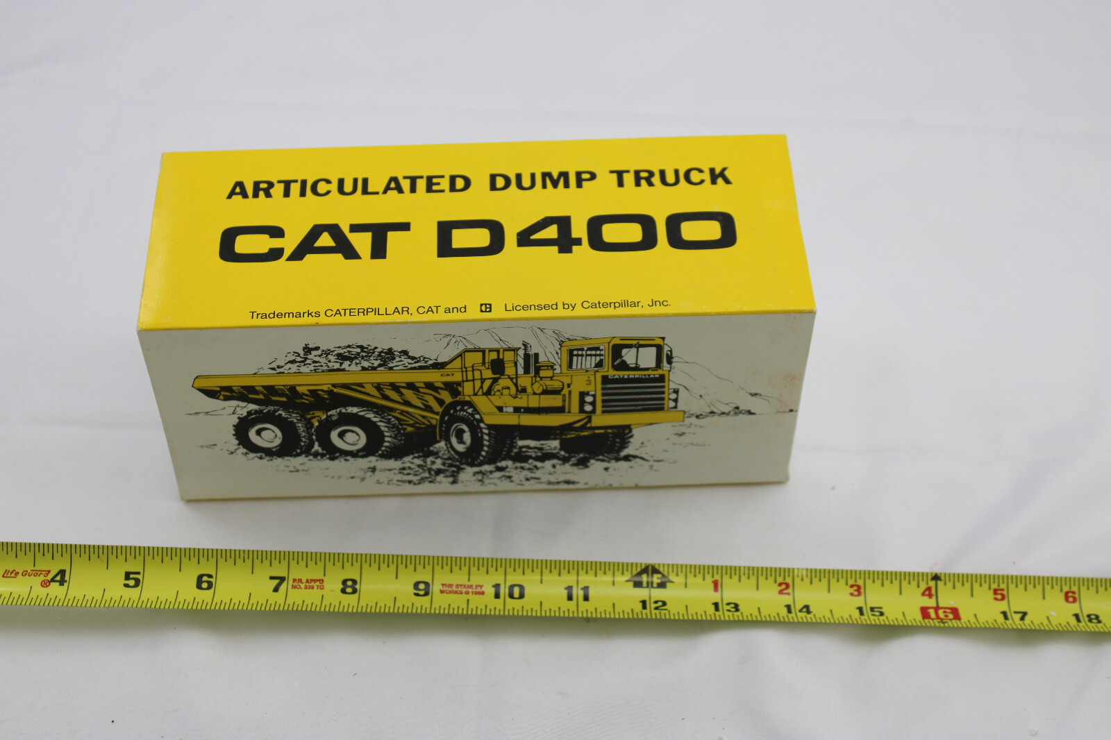 Diecast – Conrad 2862 – CAT D400 – Articulated Dump Truck