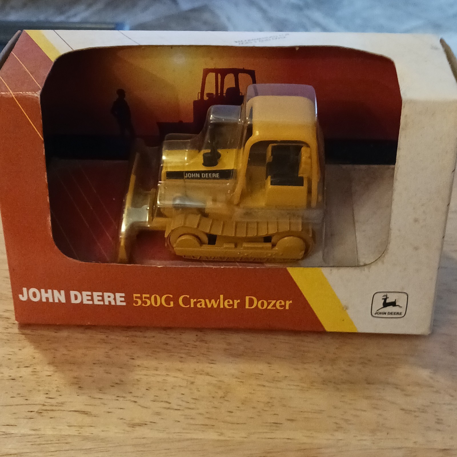 ERTL John Deere 550G Crawler Dozer 1:64 Diecast Yellow/Black Movable Tracks 568