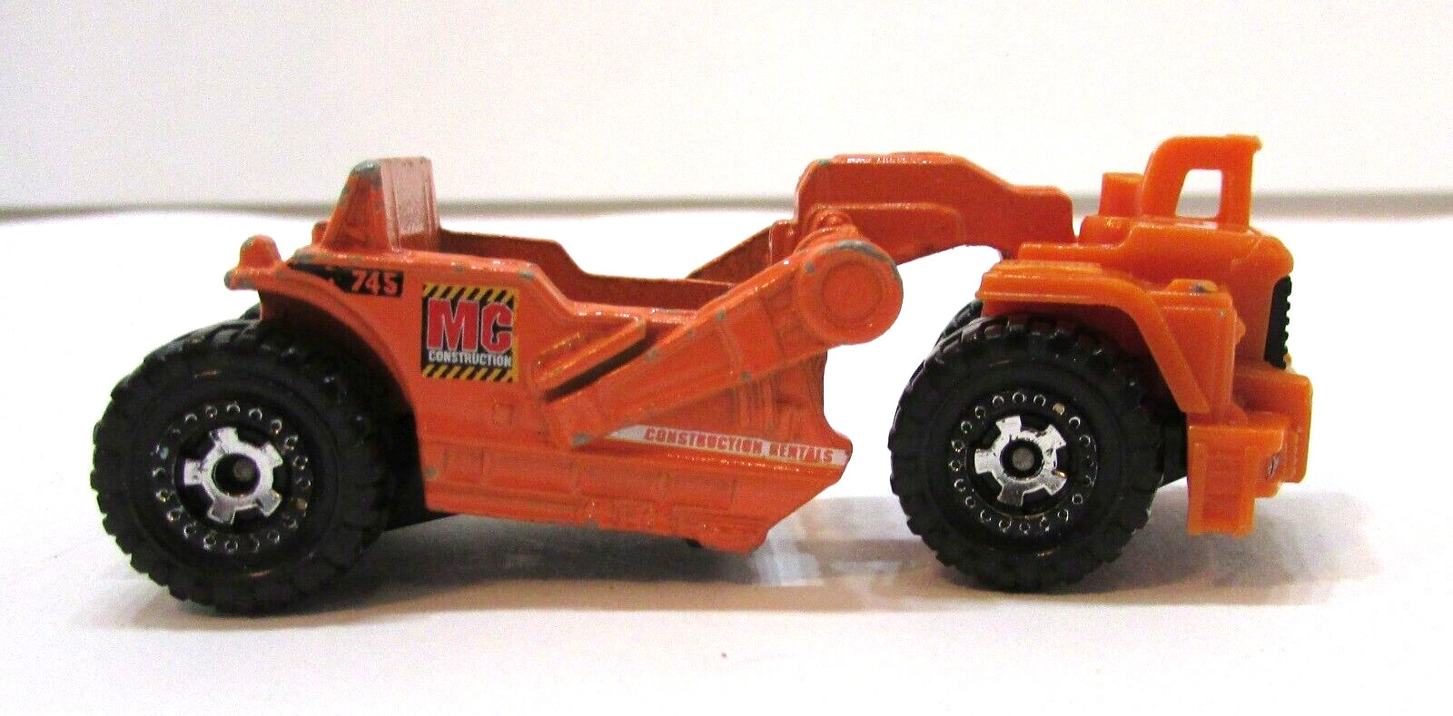 2007 Mattel Matchbox Orange Scraper MC 745 Construction Rentals Diecast Plastic