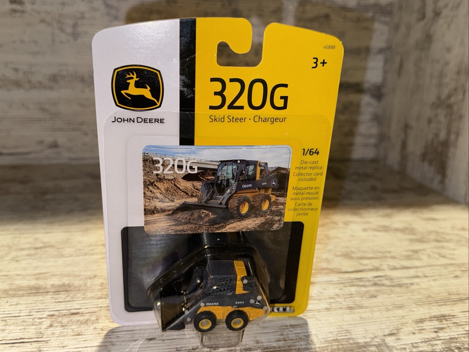 1/64 Scale John Deere 320G Skid Steer Loader Die-Cast Ertl