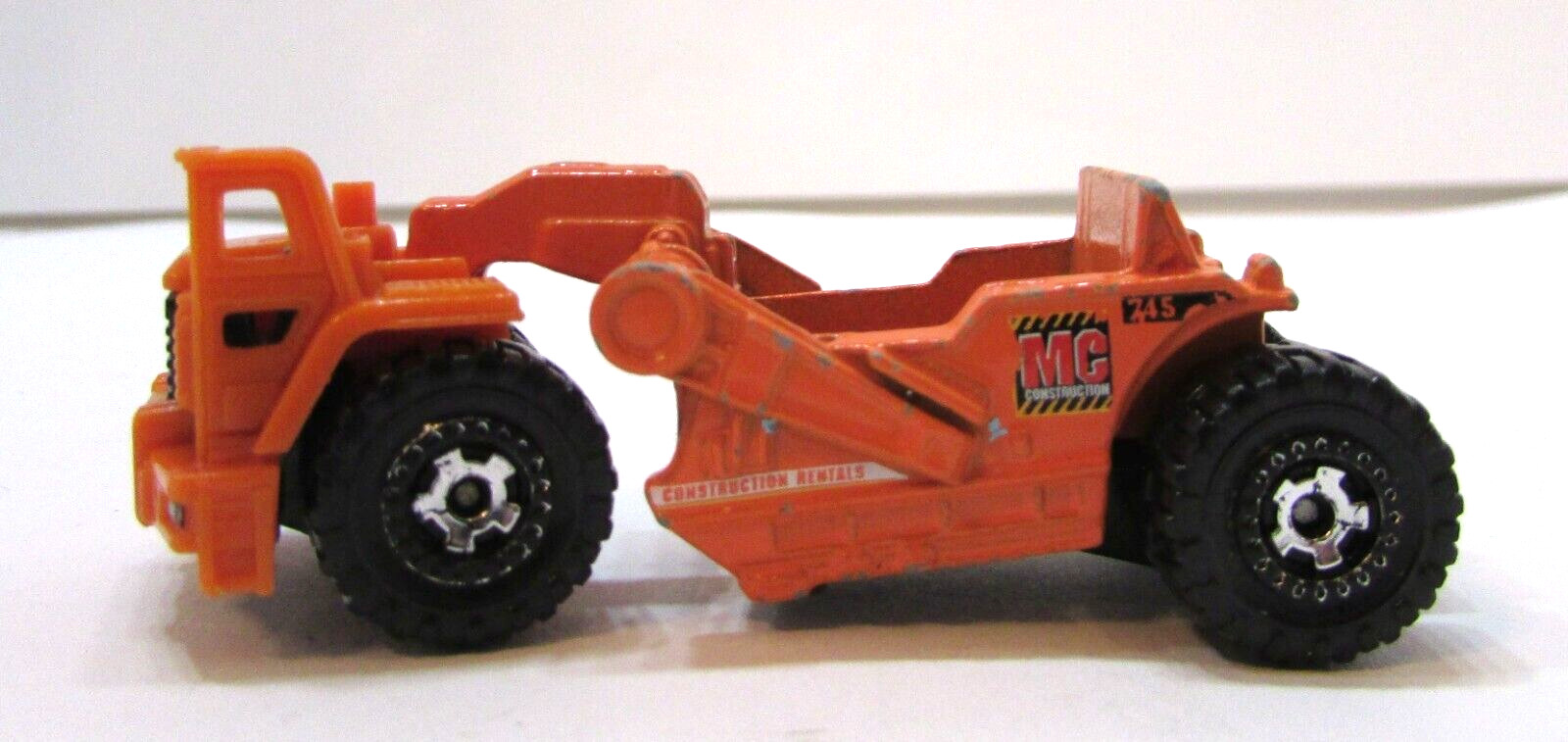 2007 Mattel Matchbox Orange Scraper MC 745 Construction Rentals Diecast Plastic